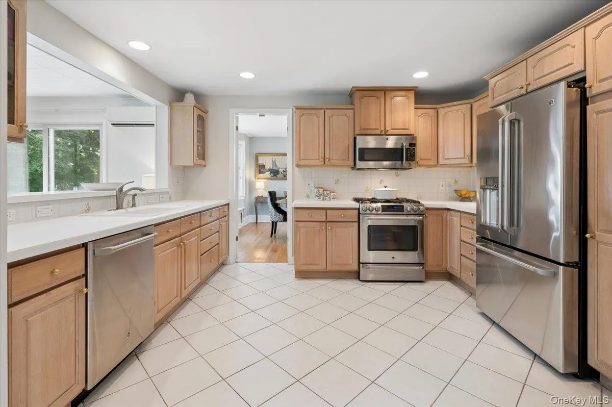 Large updated eat-in kitchen overlooking the family room. Large updated eat-in kitchen overlooking the family room.