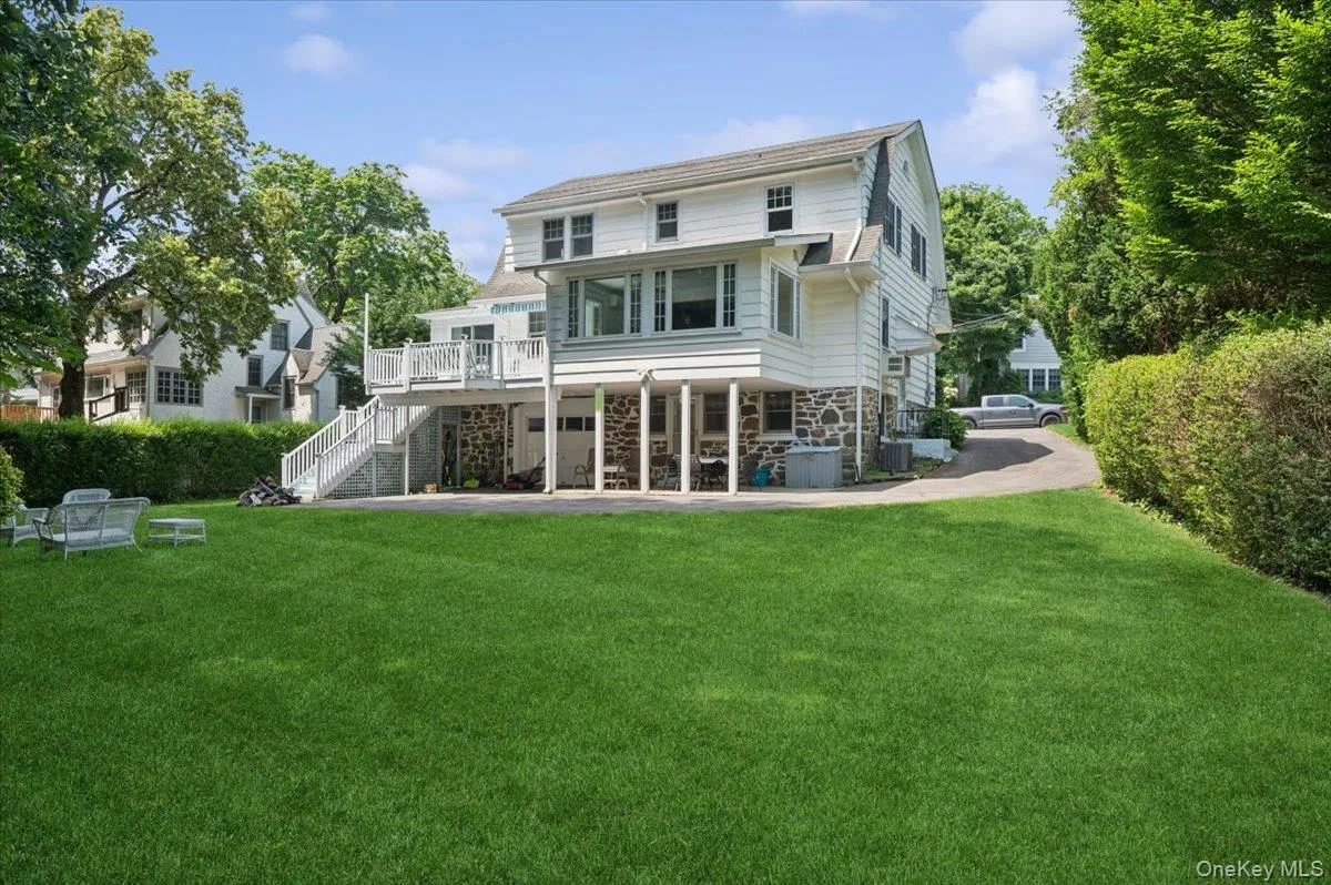 The owner uses the area under the deck as a lower level entertainment space. The owner uses the area under the deck as a lower level entertainment space.
