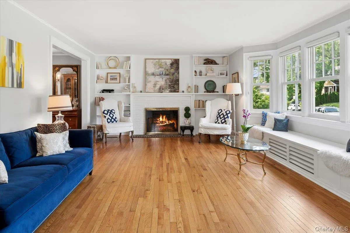 Very large living room with a gas fireplace. Love the built-ins and mantel. Very large living room with a gas fireplace. Love the built-ins and mantel.