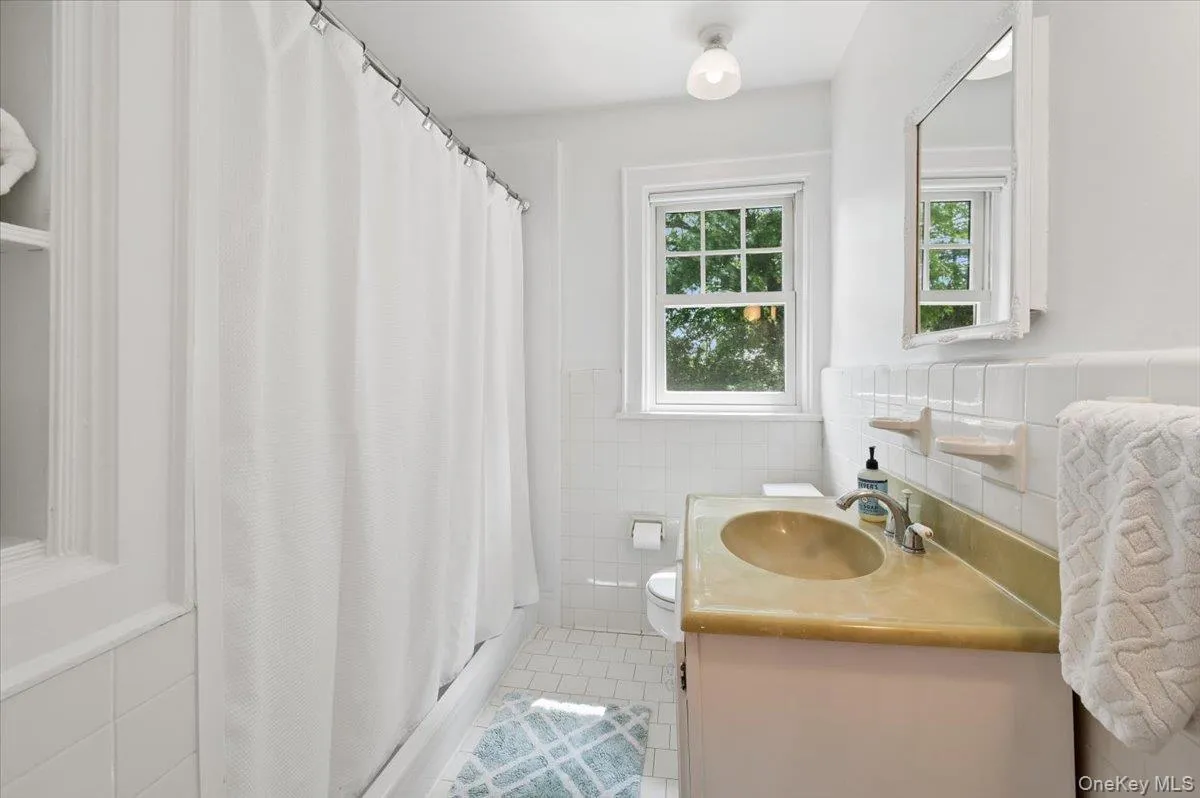 Hall bath with vanity. Hall bath with vanity.