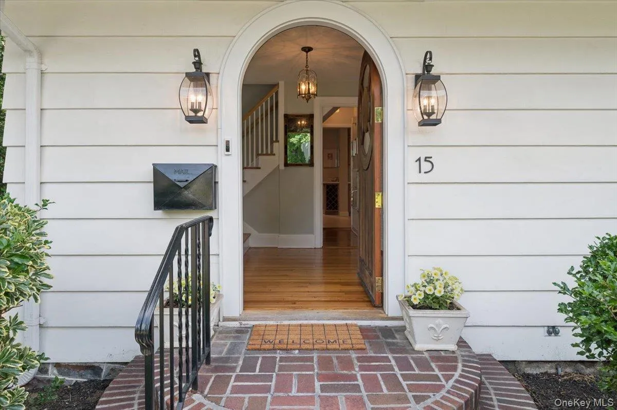 Love the arched door...this is a major Halloween trick or treating block so get ready to put pumpkins on this gorgeous entry! Love the arched door...this is a major Halloween trick or treating block so get ready to put pumpkins on this gorgeous entry!
