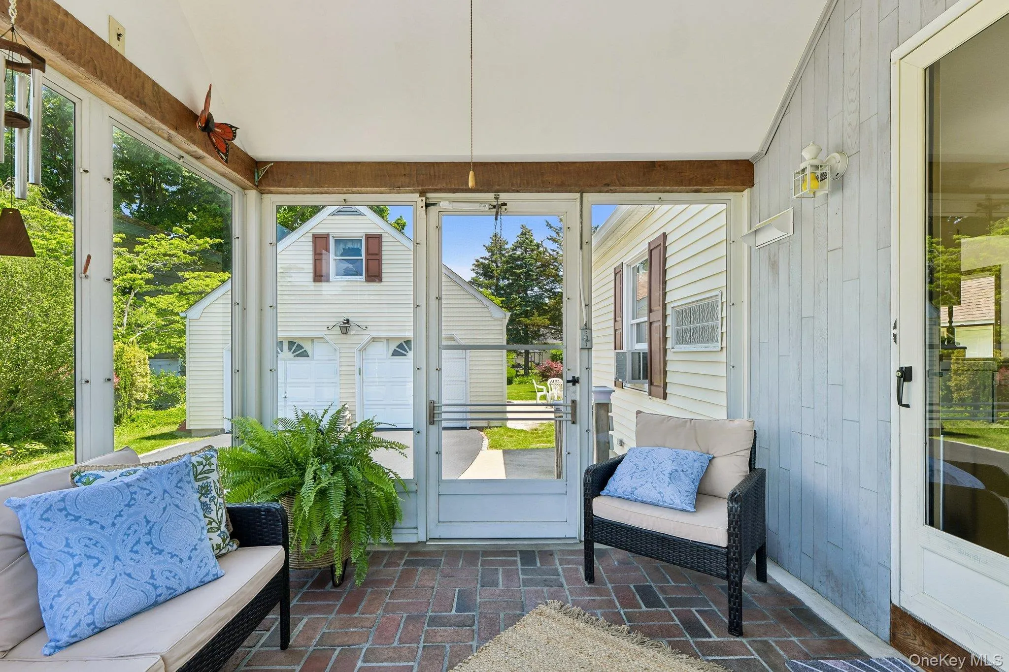You are going to love this glass enclosed Sunroom! You are going to love this glass enclosed Sunroom!