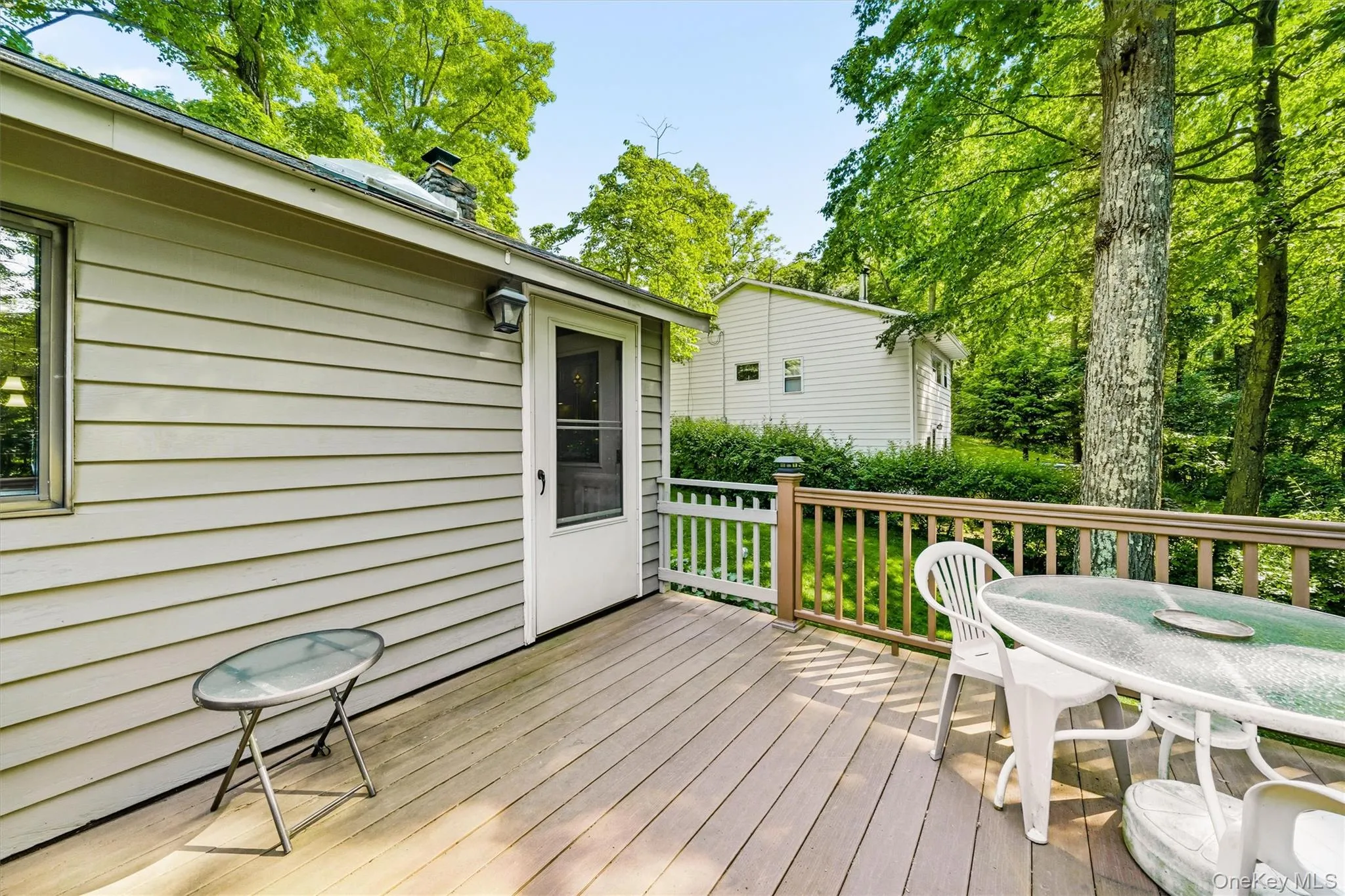 Expansive deck off of living room Expansive deck off of living room