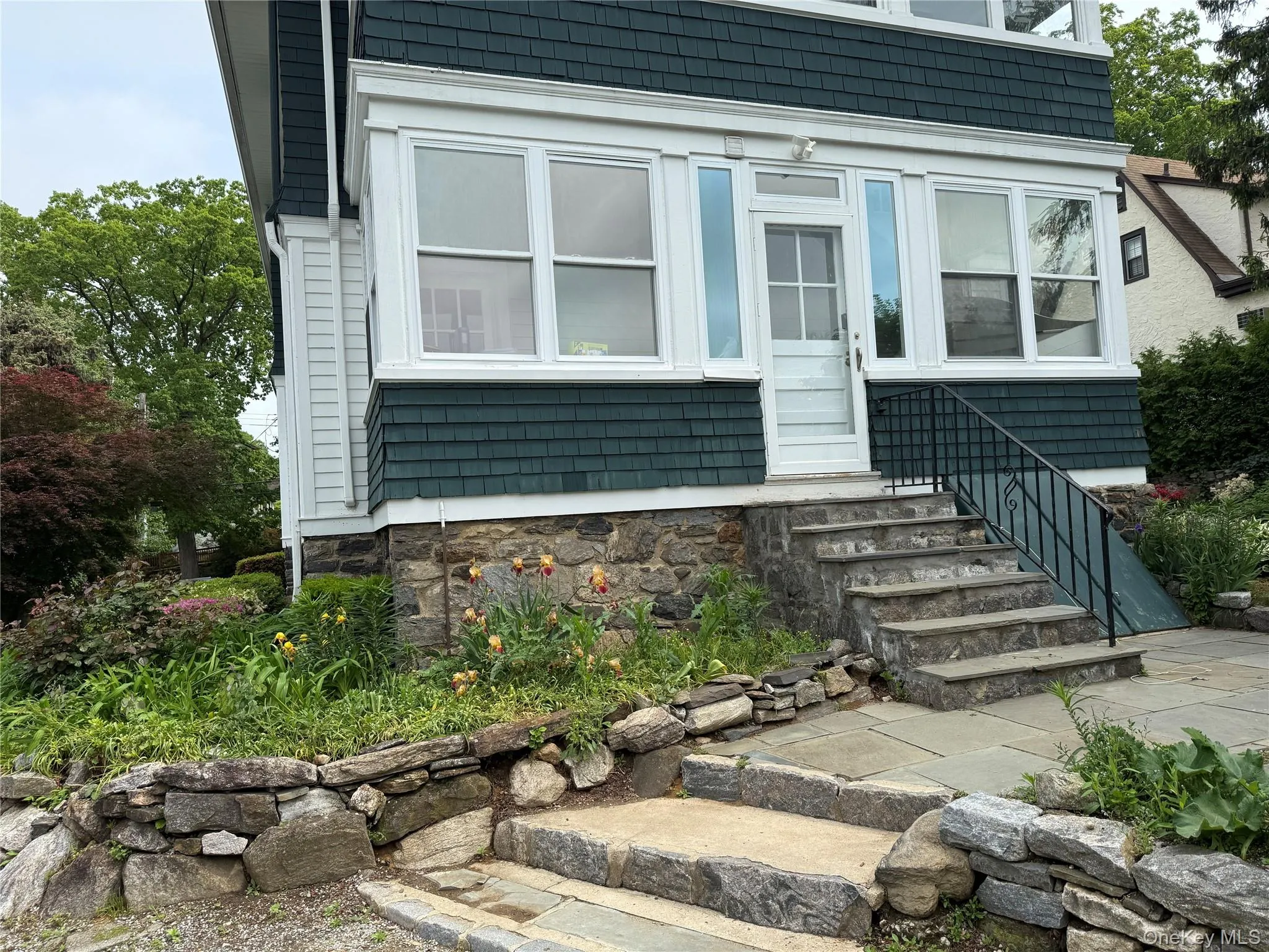 View of back sunroom rear entry steps View of back sunroom rear entry steps