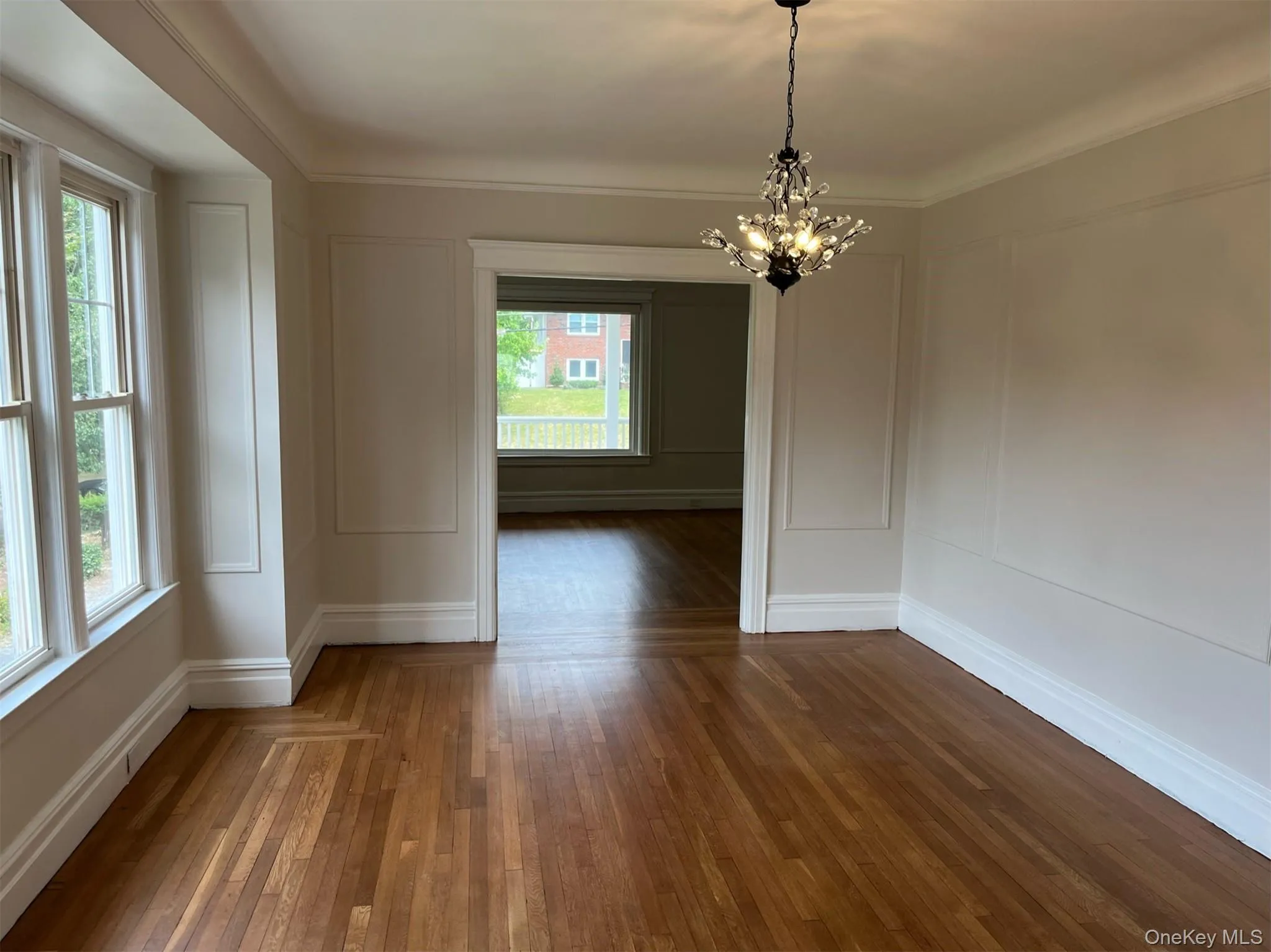 Dining room featuring a chandelier, plenty of natural light Dining room featuring a chandelier, plenty of natural light