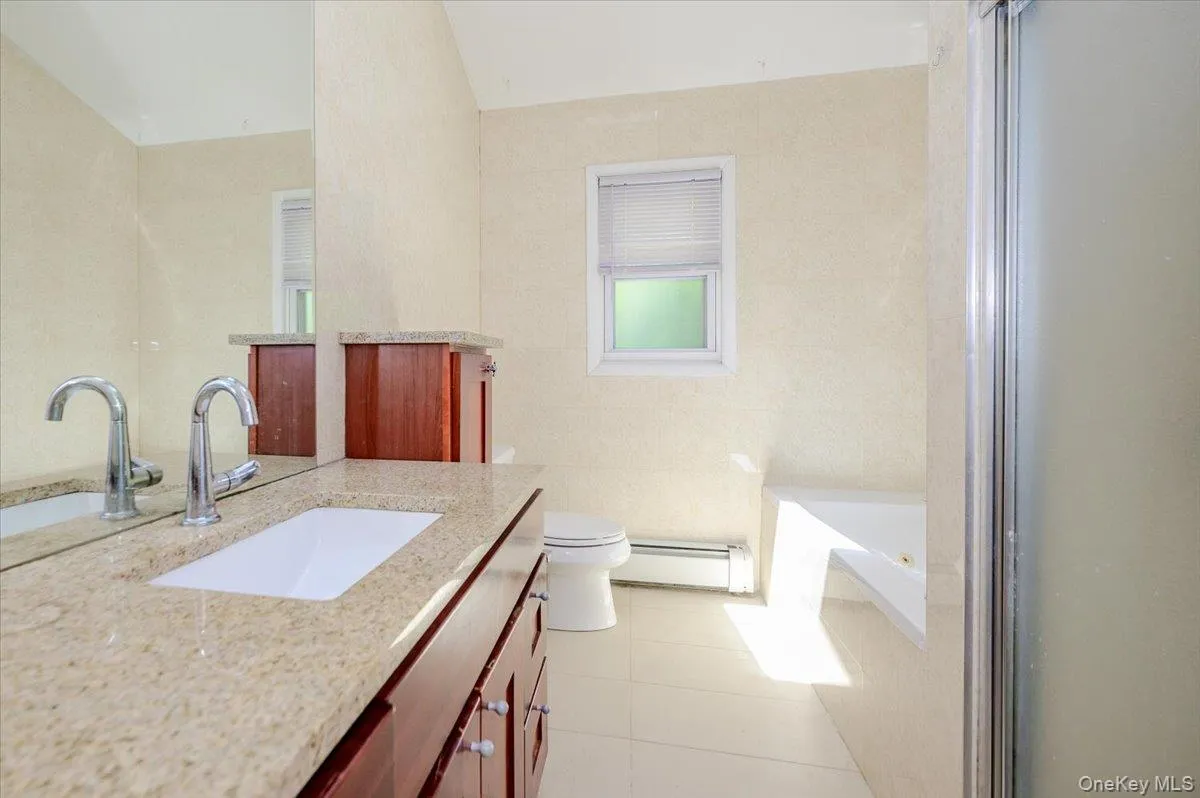 Updated Hall Bathroom w/jetted tub Updated Hall Bathroom w/jetted tub