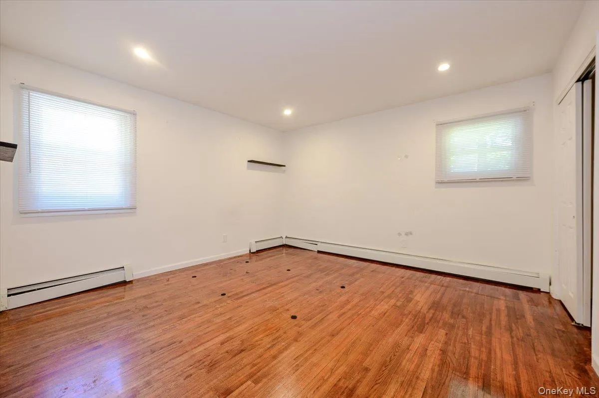 Bedroom #2 with hardwood floors & high hats Bedroom #2 with hardwood floors & high hats