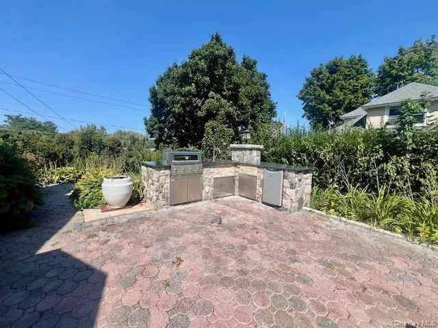 Private Patio with BBQ Grill and Fridge Private Patio with BBQ Grill and Fridge