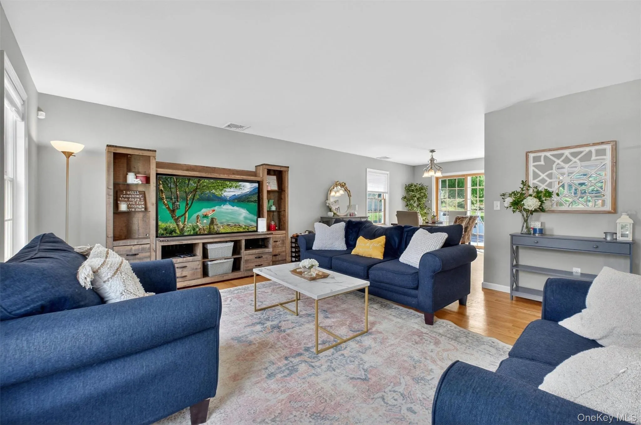 The living room opens to the formal dining room. The living room opens to the formal dining room.