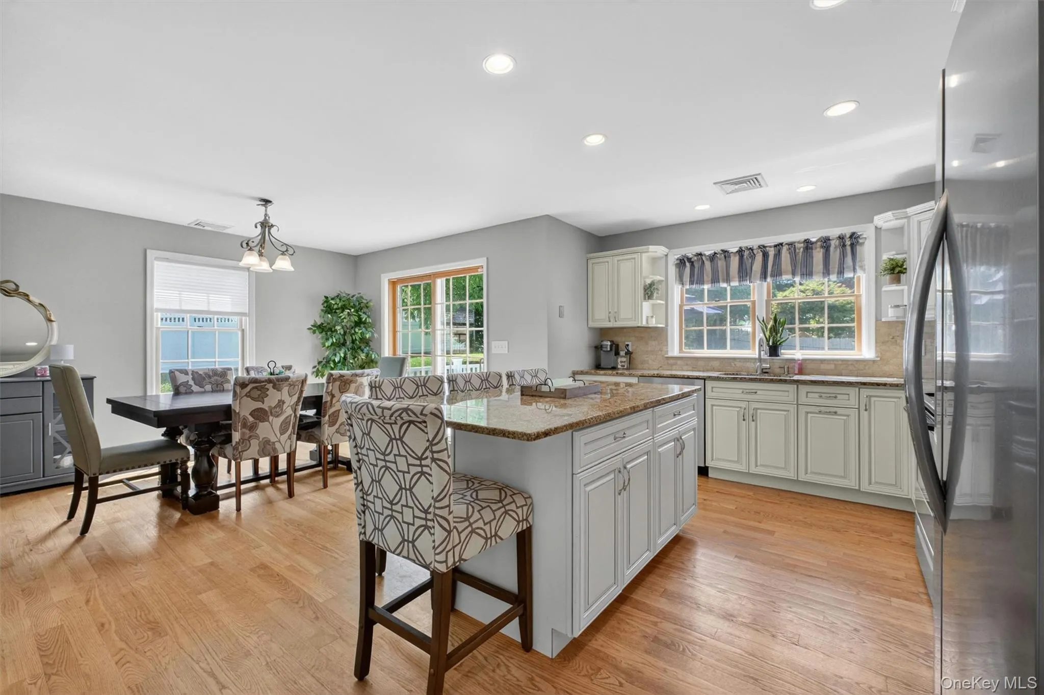The kitchen overlooks the incredible backyard. The kitchen overlooks the incredible backyard.
