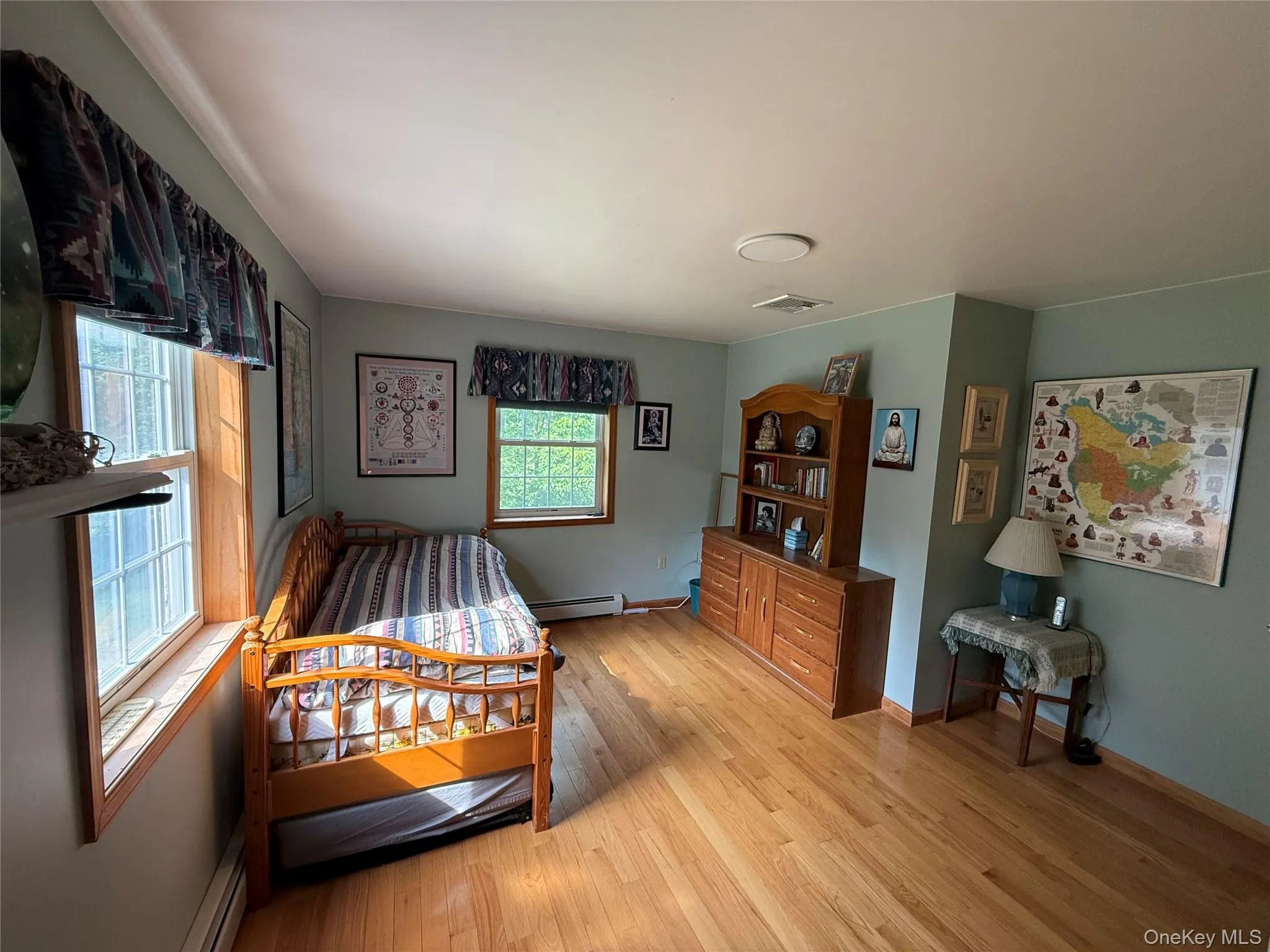 Bedroom #2 with Hardwood Floors & Large double closet on Second Floor Bedroom #2 with Hardwood Floors & Large double closet on Second Floor