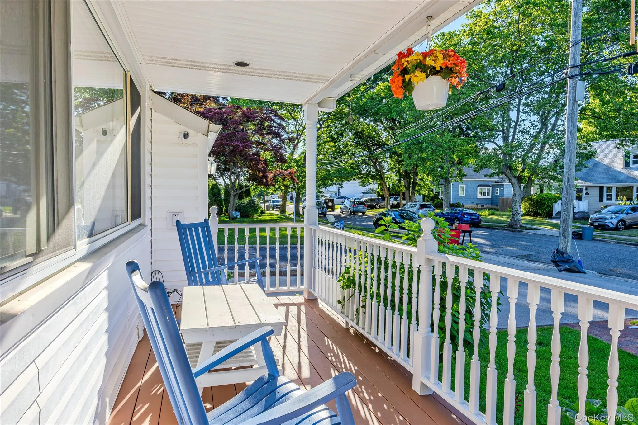 comfortable front porch in a quiet neighborhood comfortable front porch in a quiet neighborhood