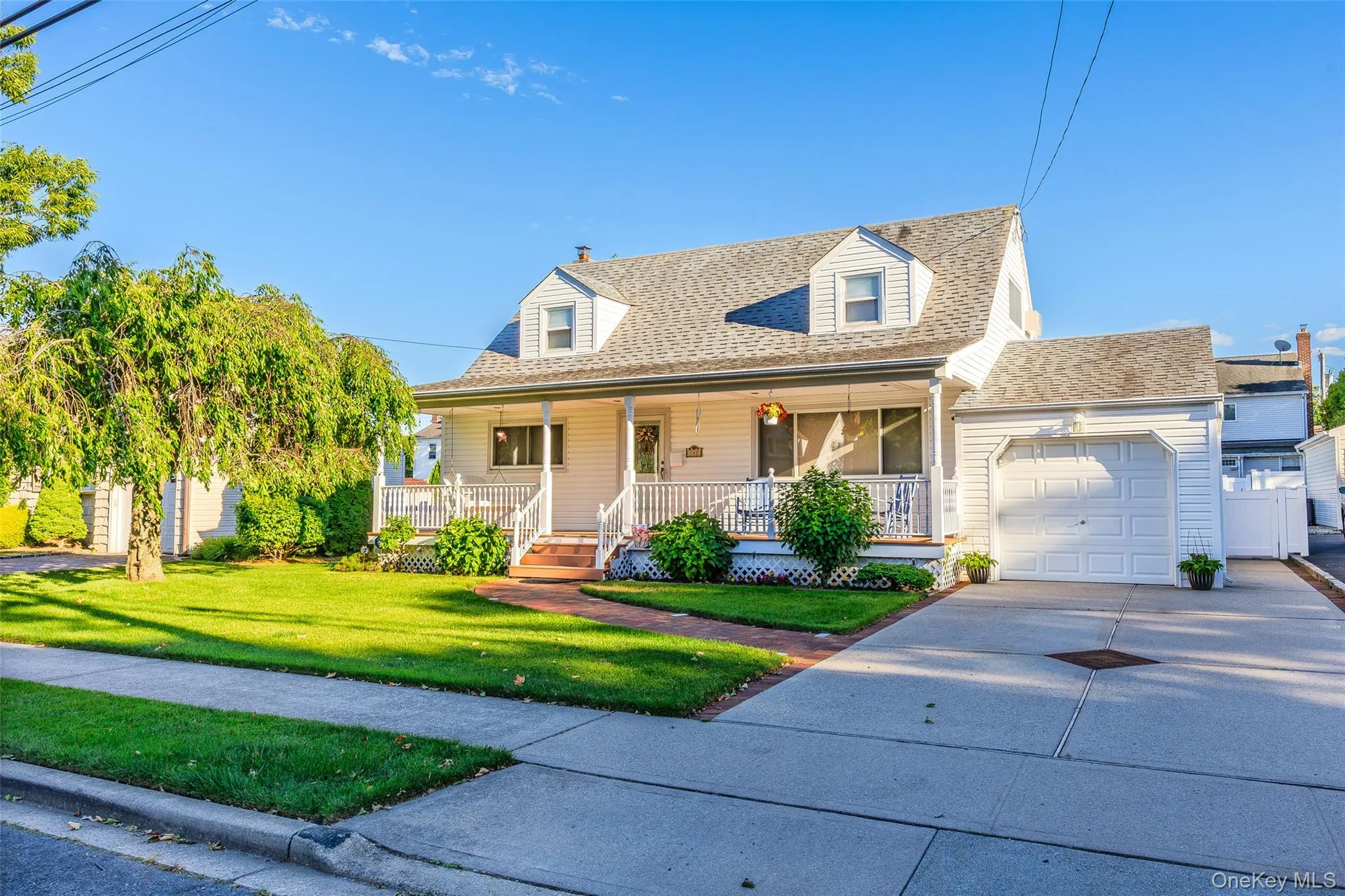 front porch, attached garage, landscaping front porch, attached garage, landscaping