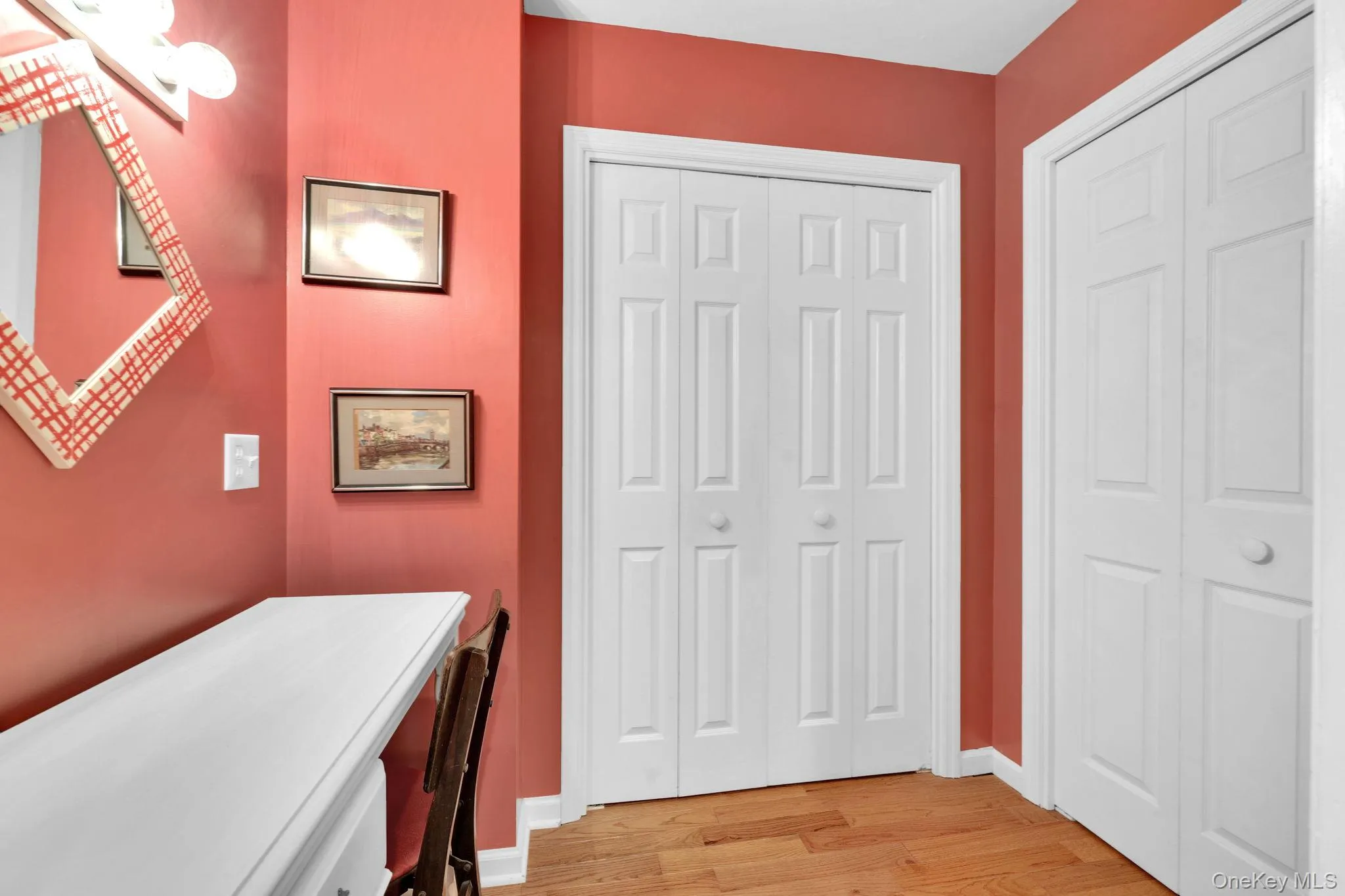 Closet area with two closets and room for wardrobe or vanity. Closet area with two closets and room for wardrobe or vanity.