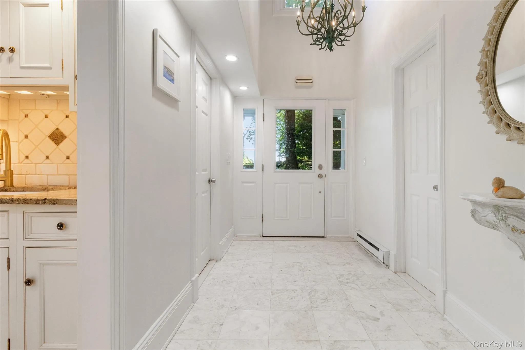 Foyer with beautiful marble floors Foyer with beautiful marble floors