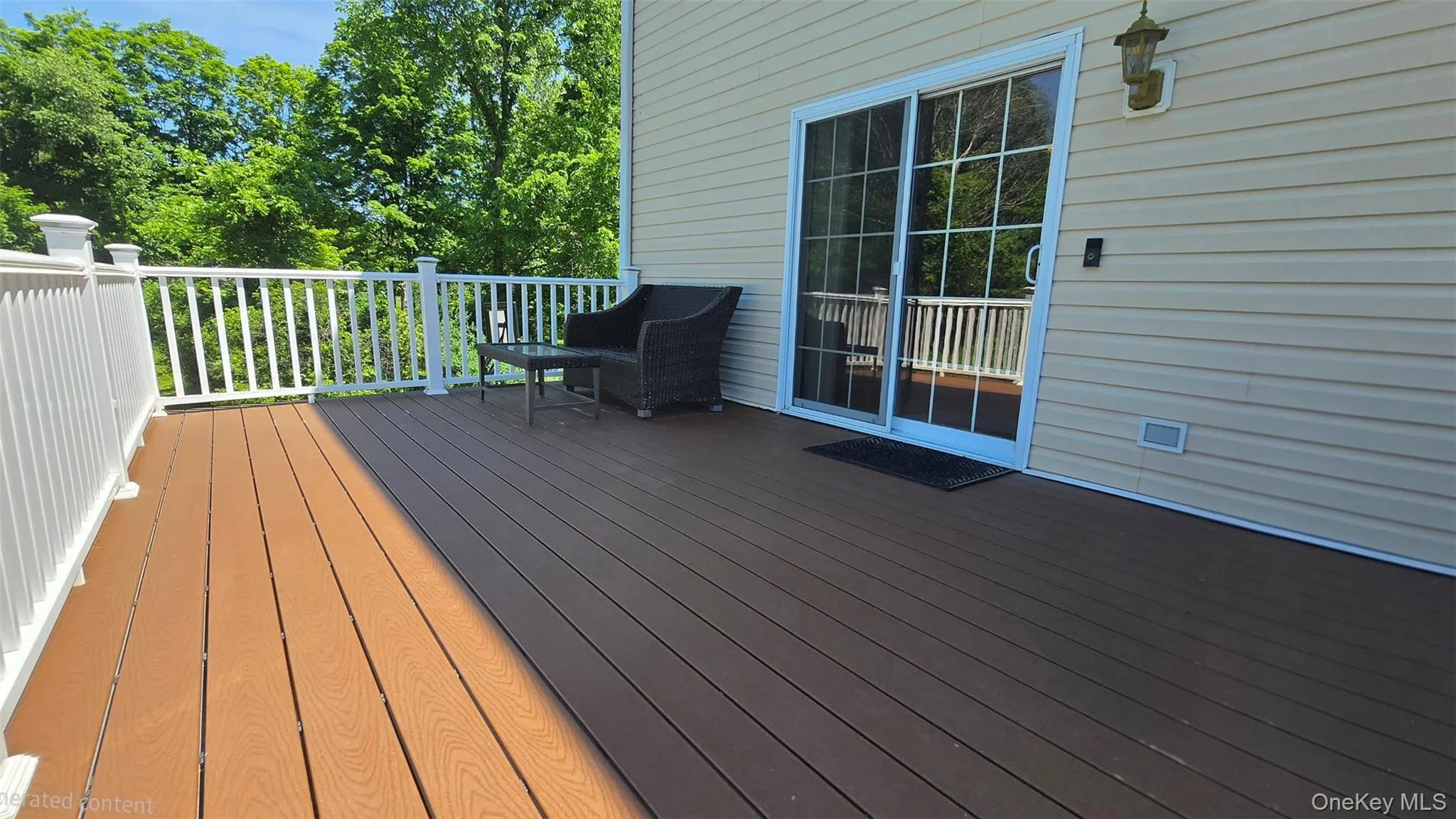 Sliders from family room bring you to this large trex deck, recently installed. Sliders from family room bring you to this large trex deck, recently installed.