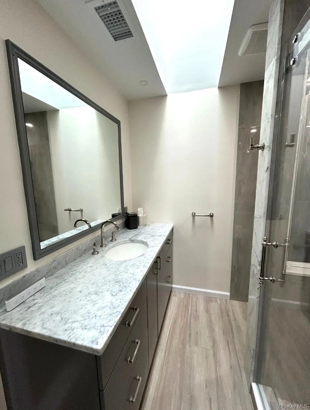 The Handmade, Custom Oversized Stone Topped Vanity & All High End Upgraded Fixtures In The Magnificent Completely Renovated Primary Bathroom. The Handmade, Custom Oversized Stone Topped Vanity & All High End Upgraded Fixtures In The Magnificent Completely Renovated Primary Bathroom.