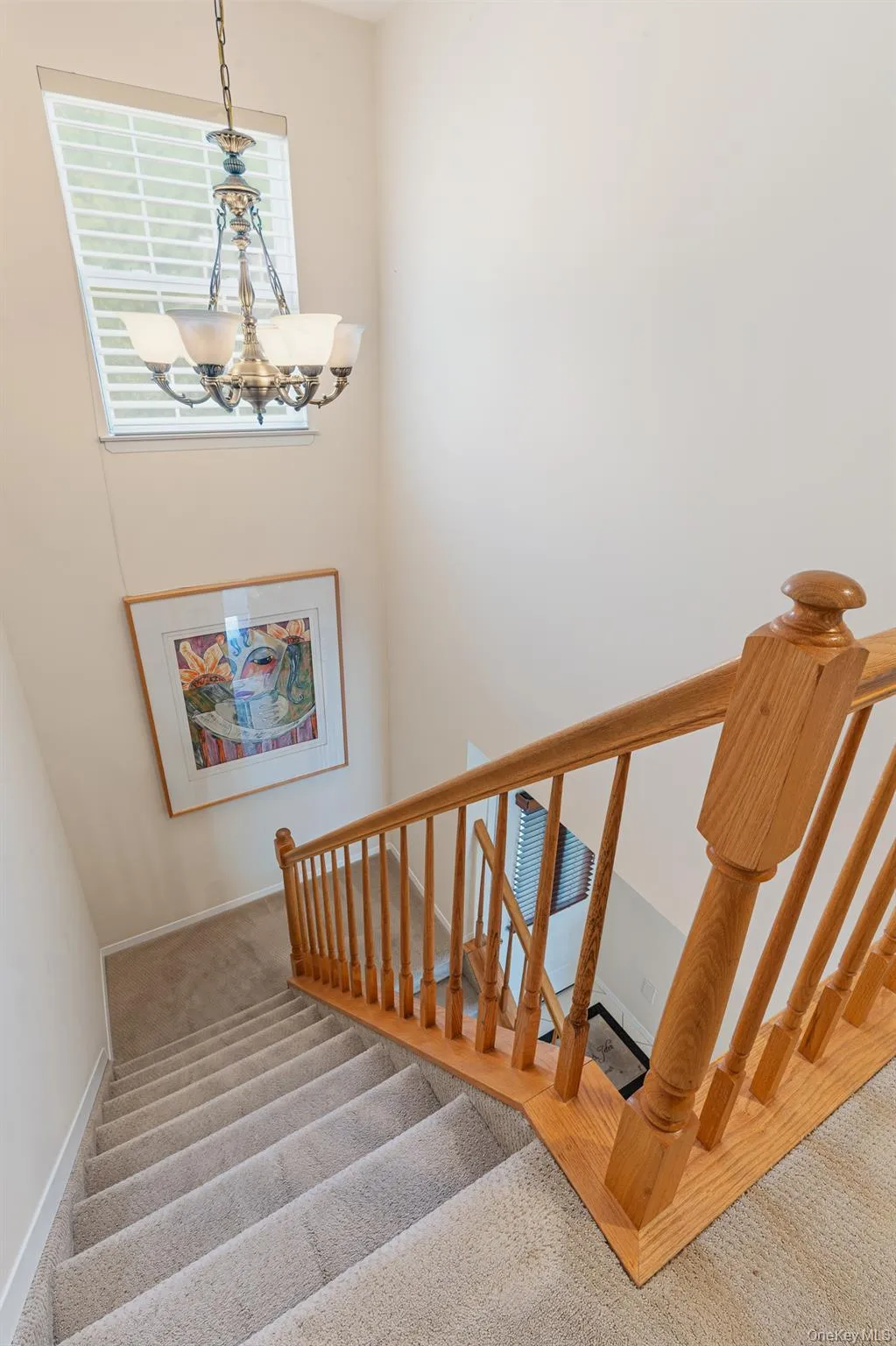 The Beautiful Open Stairway To The Second Level Offers A Lovely Picture Window For Natural Light, Oak Bannisters And Oak Railings. The Beautiful Open Stairway To The Second Level Offers A Lovely Picture Window For Natural Light, Oak Bannisters And Oak Railings.