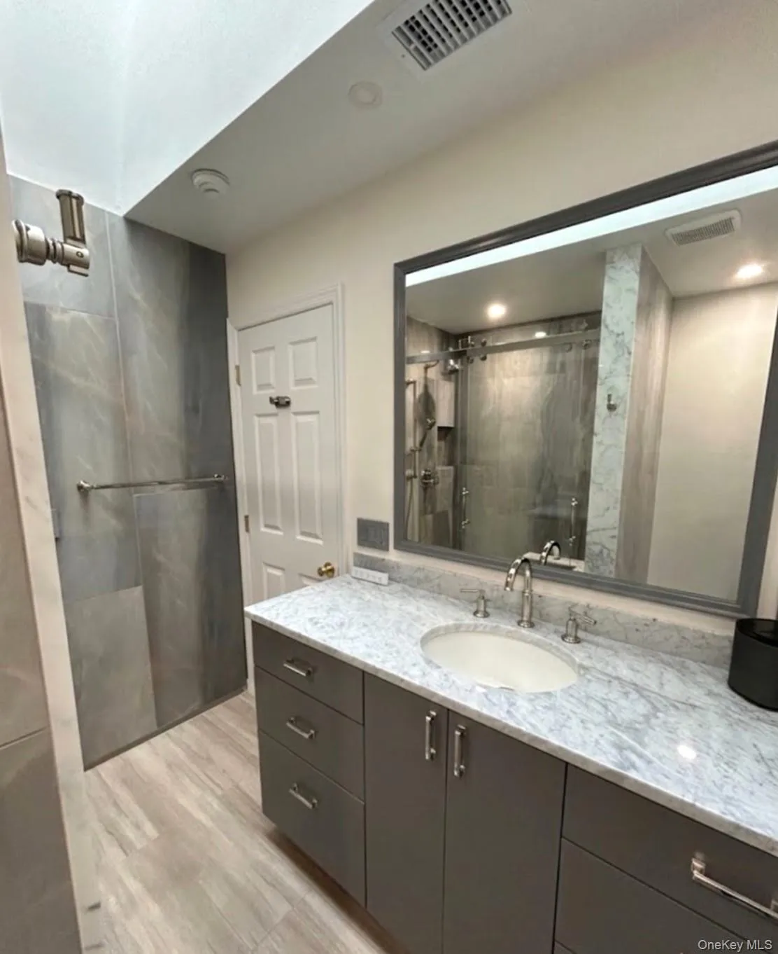 The Handmade, Custom Oversized Stone Topped Vanity & All High End Upgraded Fixtures In The Magnificent Completely Renovated Primary Bathroom. The Handmade, Custom Oversized Stone Topped Vanity & All High End Upgraded Fixtures In The Magnificent Completely Renovated Primary Bathroom.