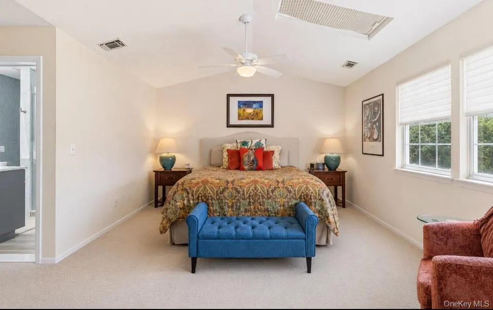 The Spectacular, Expansive Primary Bedroom Offers Vaulted Ceilings, Two Skylights For Natural Light, A Triple Window Overlooking The Lake With Beautiful Views, Ceiling Fan, Ample Room For A Large Bedroom Set/Furniture Plus A Separate Gym, Home Office Or Reading Area/Space, Huge Double Door Walk In Closet With Wraparound Walls Of Custom Cabinetry, Storage Shelves & Drawers, And Stunning New Primary Bathroom. The Spectacular, Expansive Primary Bedroom Offers Vaulted Ceilings, Two Skylights For Natural Light, A Triple Window Overlooking The Lake With Beautiful Views, Ceiling Fan, Ample Room For A Large Bedroom Set/Furniture Plus A Separate Gym, Home Office Or Reading Area/Space, Huge Double Door Walk In Closet With Wraparound Walls Of Custom Cabinetry, Storage Shelves & Drawers, And Stunning New Primary Bathroom.