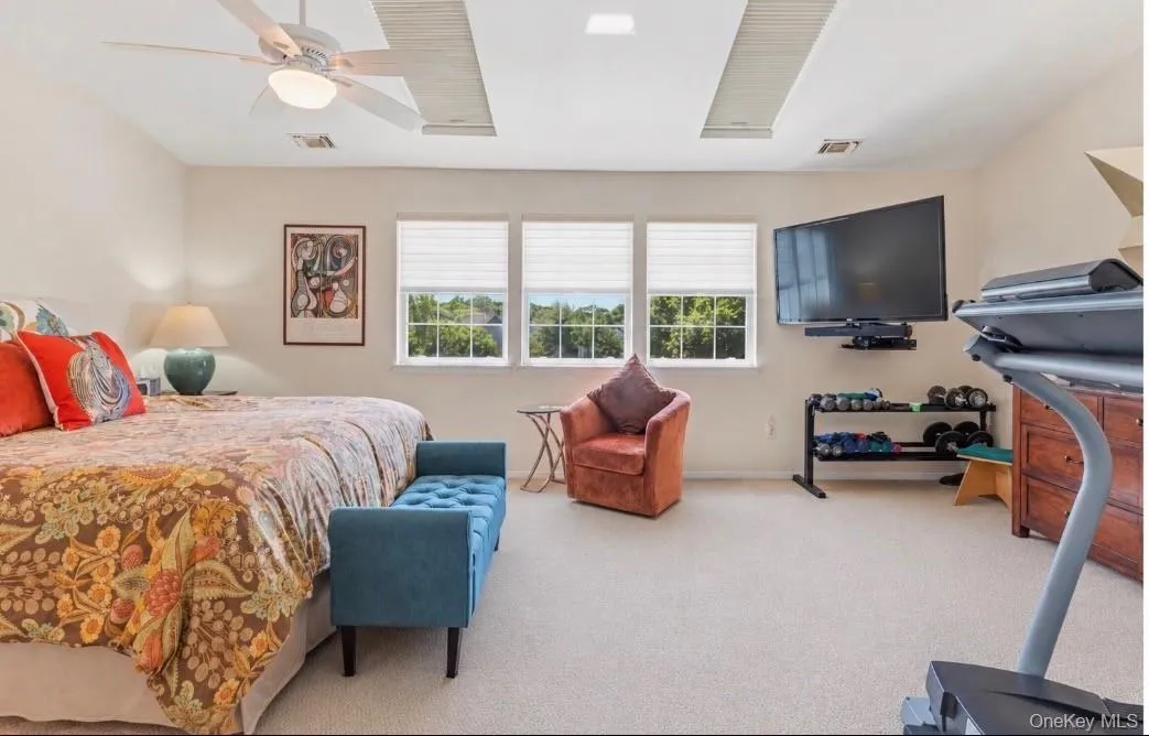 The Spectacular, Expansive Primary Bedroom Offers Vaulted Ceilings, Two Skylights For Natural Light, A Triple Window Overlooking The Lake With Beautiful Views, Ceiling Fan, Ample Room For A Large Bedroom Set/Furniture Plus A Separate Gym, Home Office Or Reading Area/Space, Huge Double Door Walk In Closet With Wraparound Walls Of Custom Cabinetry, Storage Shelves & Drawers, And Stunning New Primary Bathroom. The Spectacular, Expansive Primary Bedroom Offers Vaulted Ceilings, Two Skylights For Natural Light, A Triple Window Overlooking The Lake With Beautiful Views, Ceiling Fan, Ample Room For A Large Bedroom Set/Furniture Plus A Separate Gym, Home Office Or Reading Area/Space, Huge Double Door Walk In Closet With Wraparound Walls Of Custom Cabinetry, Storage Shelves & Drawers, And Stunning New Primary Bathroom.