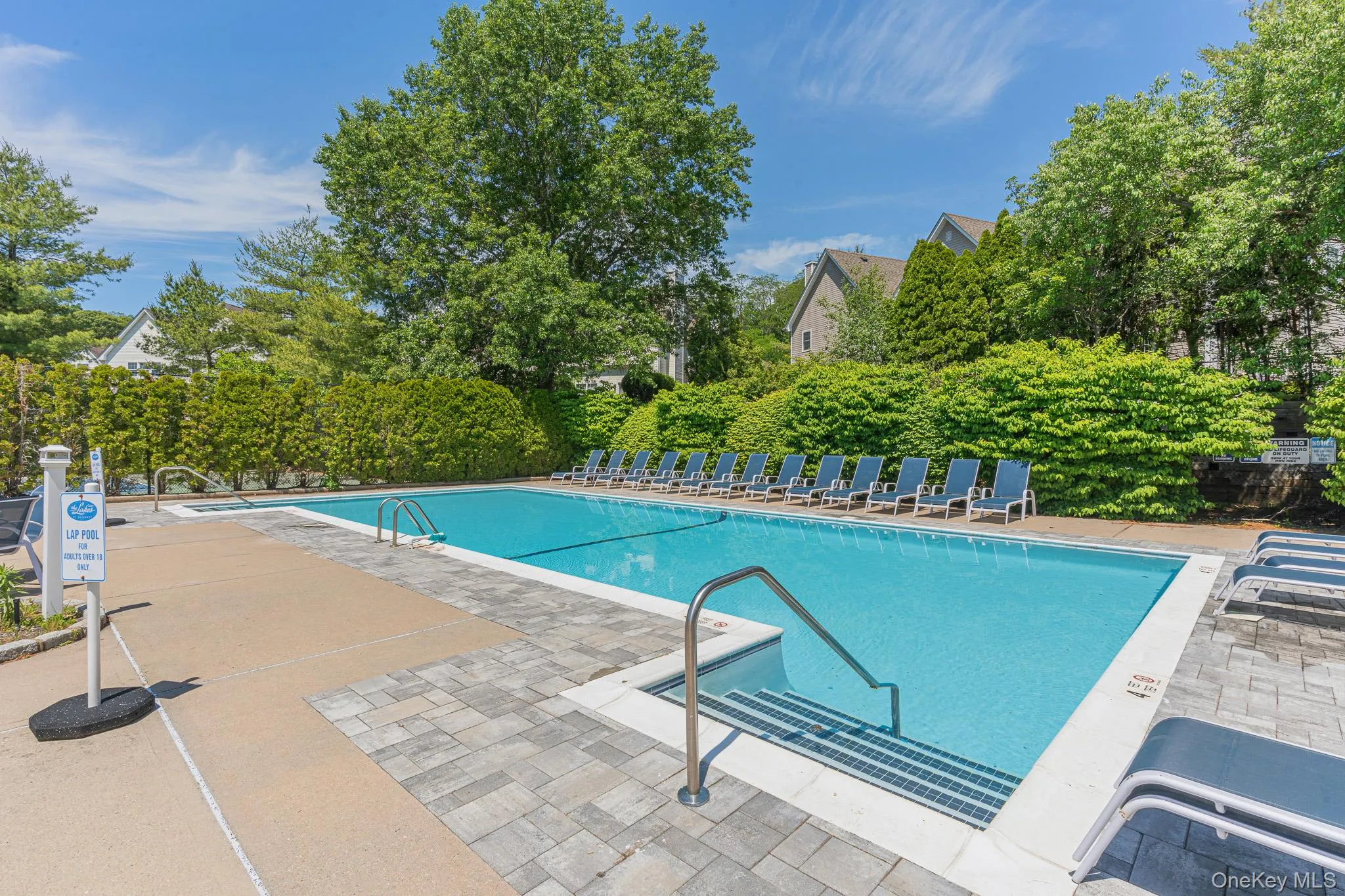 One Of The Two Large Community In Ground Pools...Escape From The Hot Summer Sun & Take A Swim In The Pool, Or Relax & Suntan On The Expansive Patios Surrounding The Pool. One Of The Two Large Community In Ground Pools...Escape From The Hot Summer Sun & Take A Swim In The Pool, Or Relax & Suntan On The Expansive Patios Surrounding The Pool.