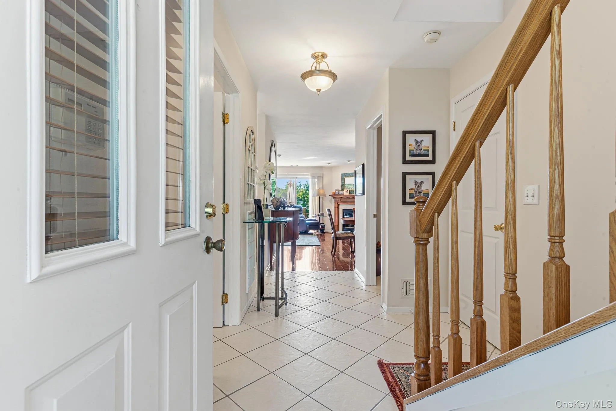The Light & Bright, Welcoming Entrance Foyer Offers Diagonal Ceramic Tile Floors, A Coat Closet, Beautiful Two Story Stairway to The Second Level, A Lovely Half Bathroom/Powder Room & Access To The Garage. The Light & Bright, Welcoming Entrance Foyer Offers Diagonal Ceramic Tile Floors, A Coat Closet, Beautiful Two Story Stairway to The Second Level, A Lovely Half Bathroom/Powder Room & Access To The Garage.