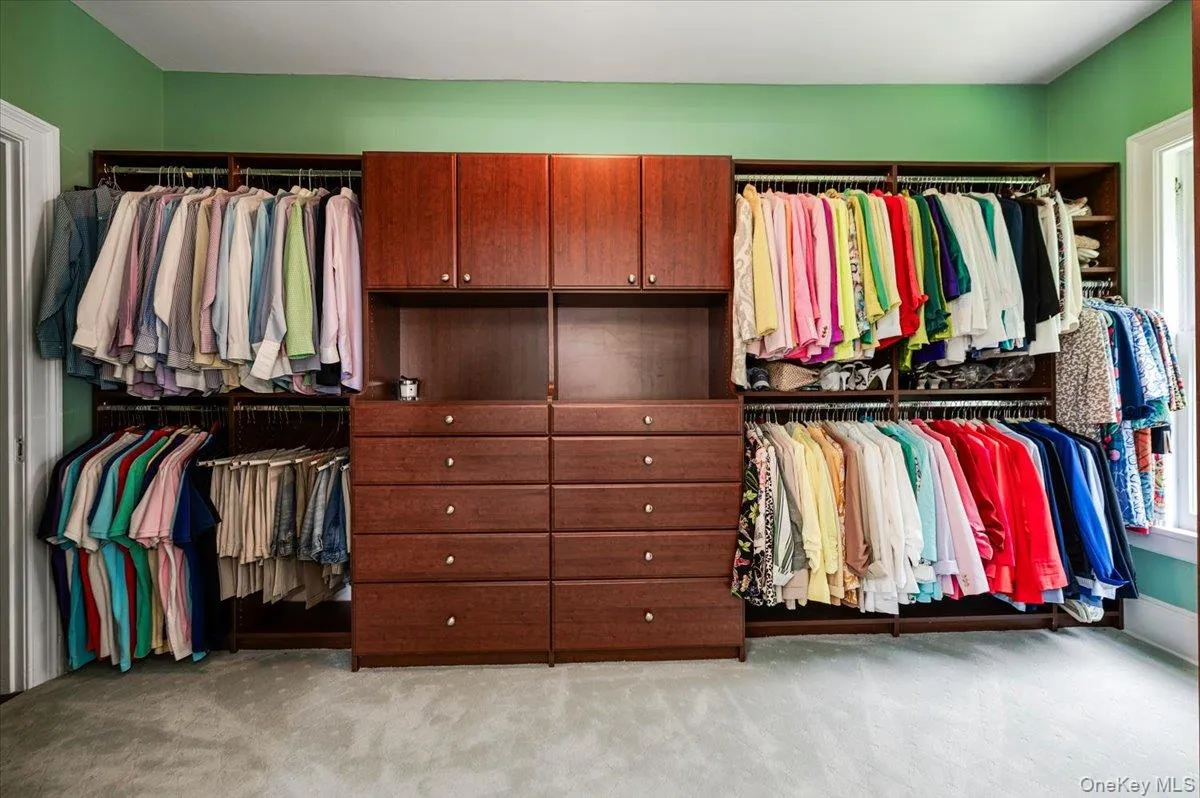 Custom walk-in closet with additional shoe closet Custom walk-in closet with additional shoe closet