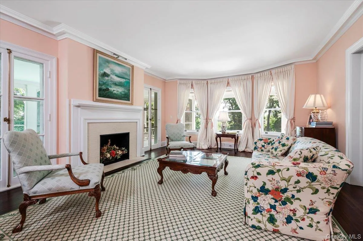 3 Sets of French doors, hardwood floors, wood burning fireplace and generous sized windows throughout 3 Sets of French doors, hardwood floors, wood burning fireplace and generous sized windows throughout