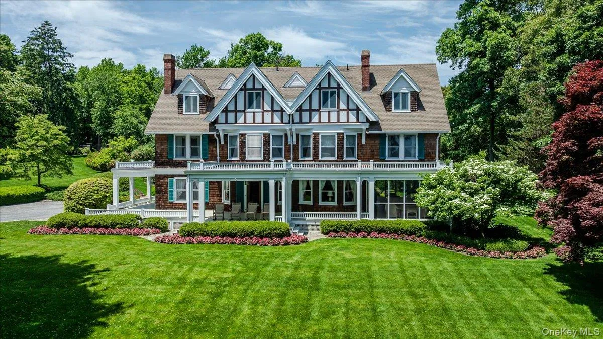 Front, side, open porches, gables, 5 fireplaces enveloped by mature plantings and trees Front, side, open porches, gables, 5 fireplaces enveloped by mature plantings and trees