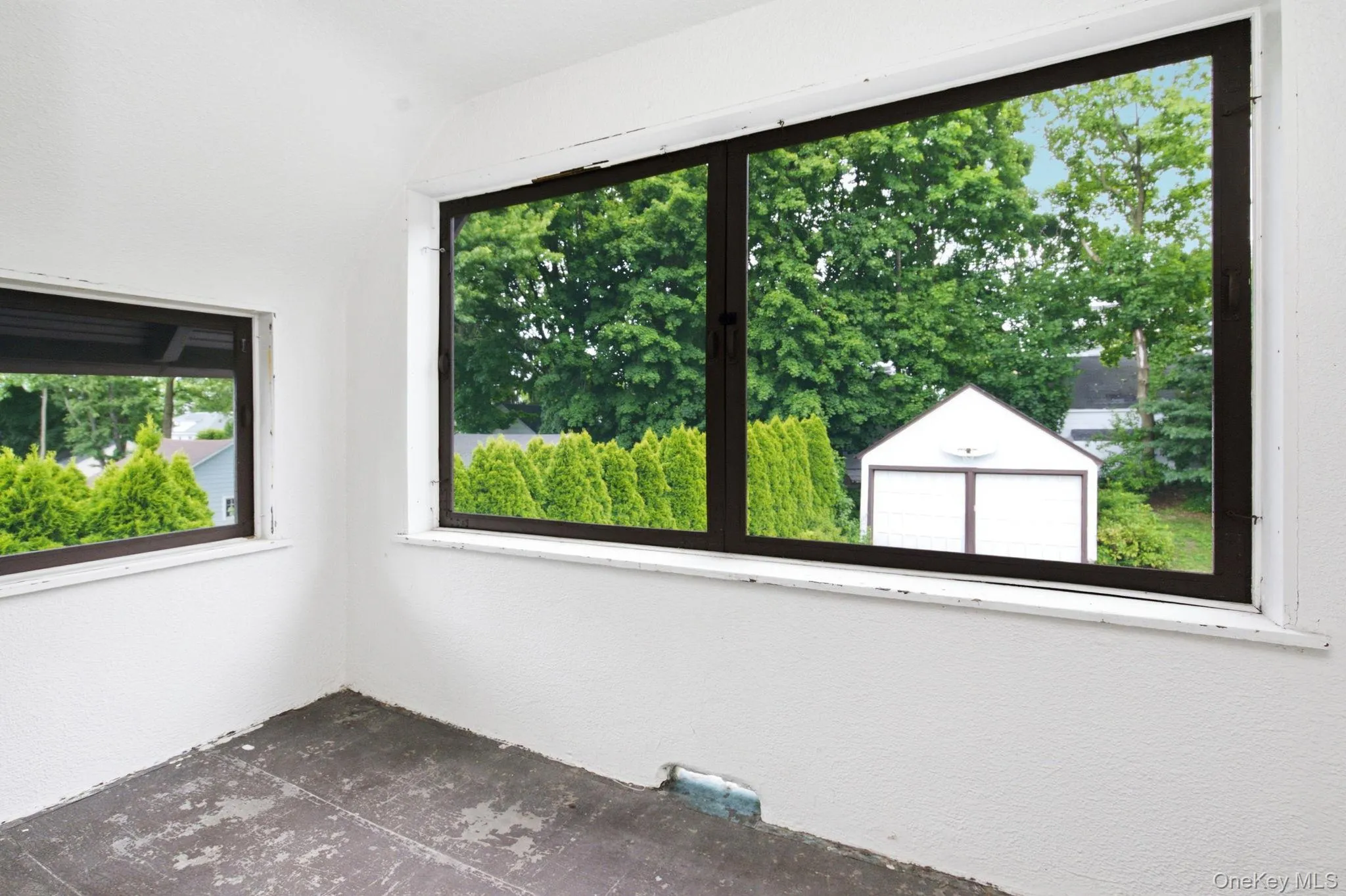 The enclosed summer porch offers a breezy perch above the treetops. The enclosed summer porch offers a breezy perch above the treetops.