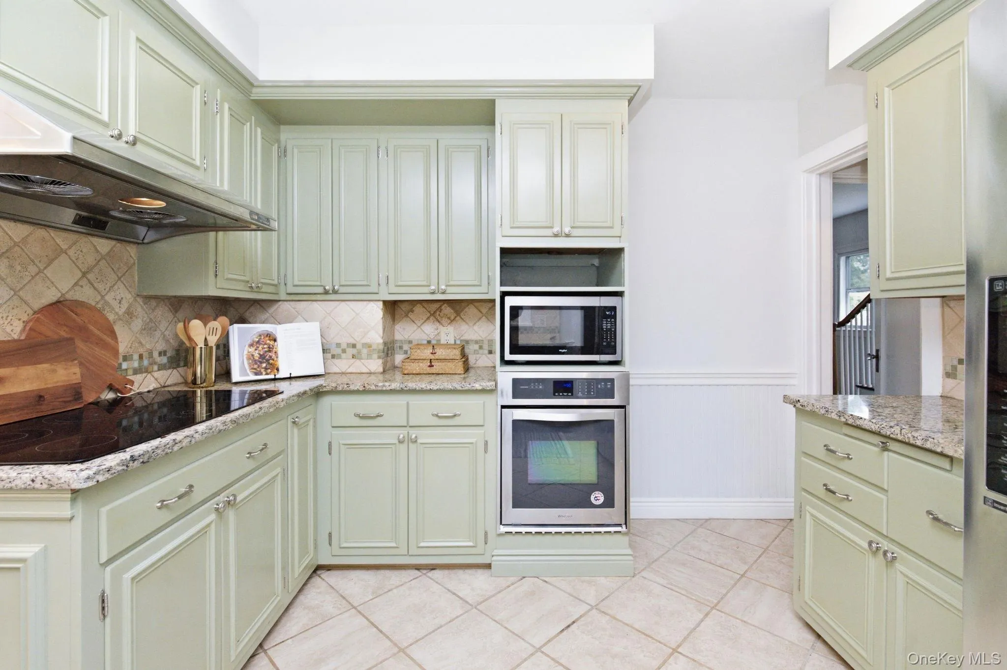 A built-in wall oven and microwave streamline meal prep. A built-in wall oven and microwave streamline meal prep.