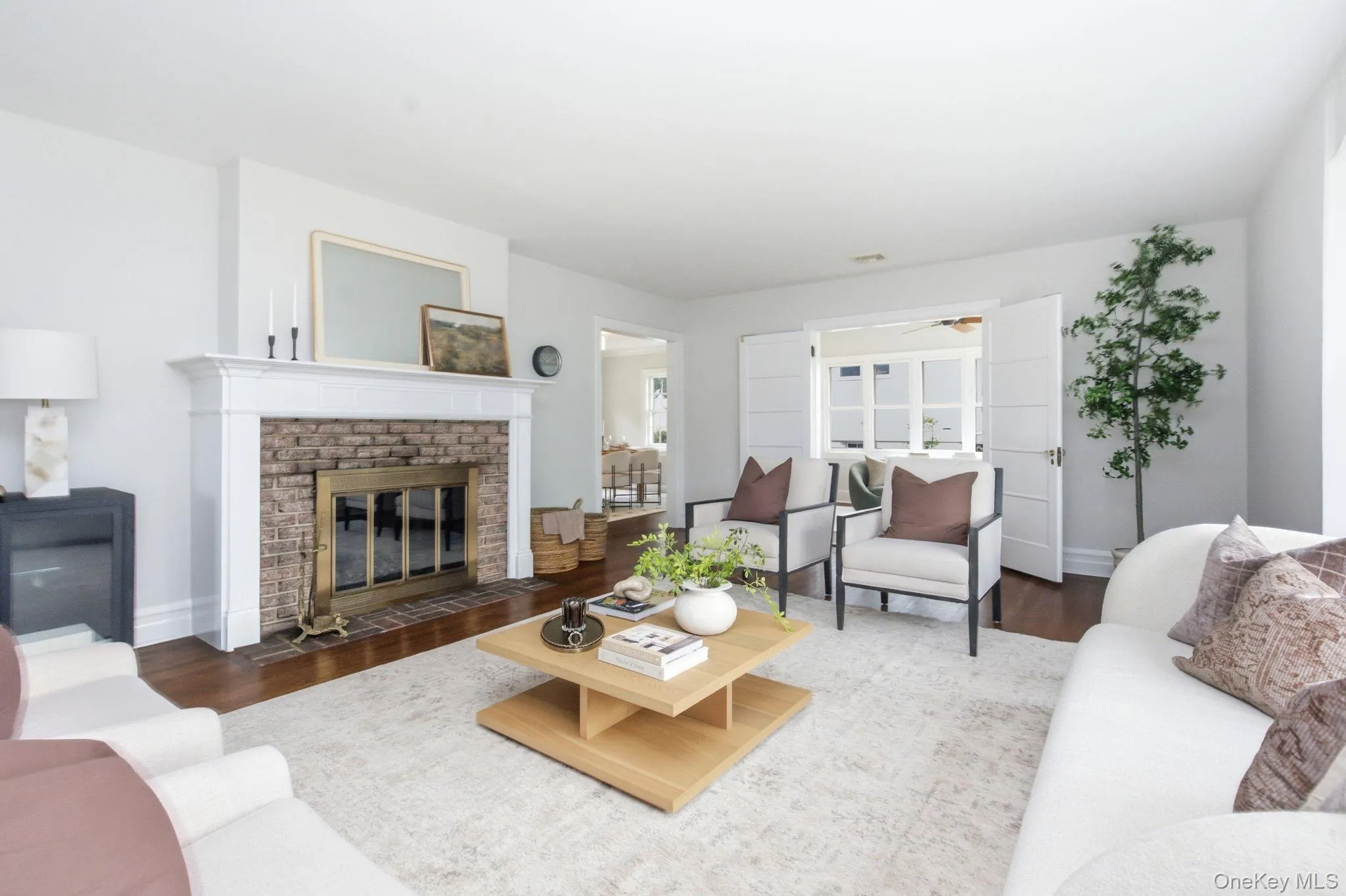 Multiple seating areas fit easily around the hearth. Multiple seating areas fit easily around the hearth.