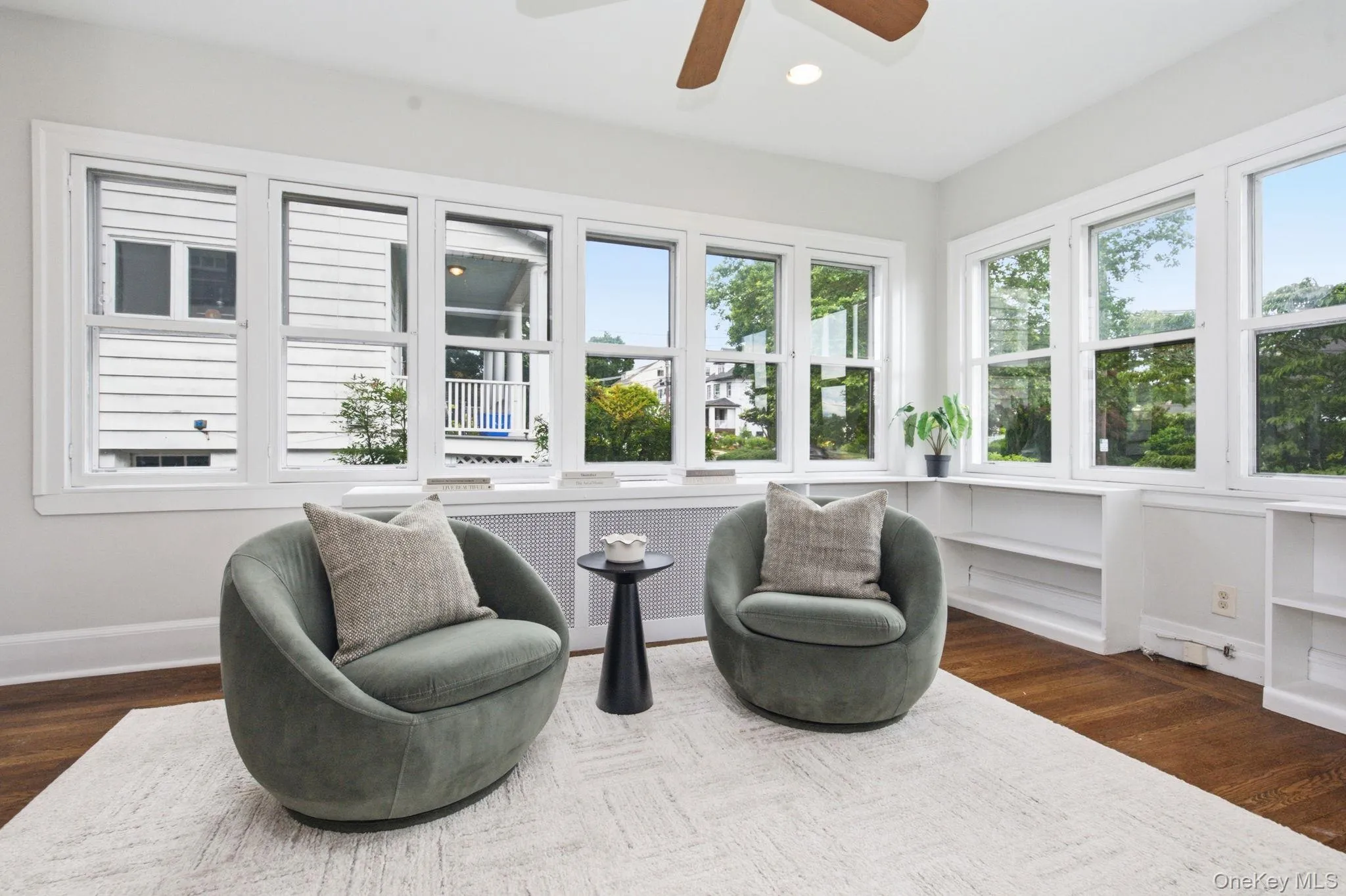 The sun/family room enjoys leafy views in every direction. The sun/family room enjoys leafy views in every direction.
