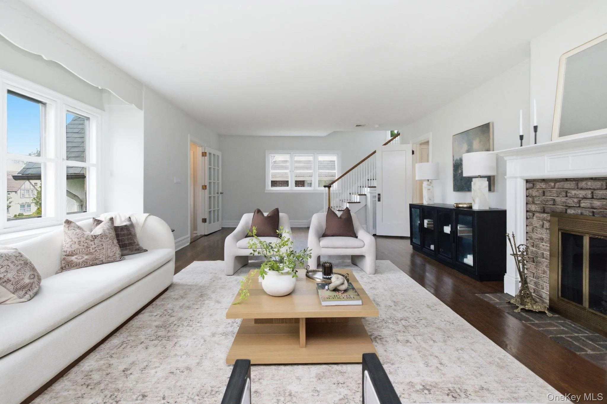 The expansive living room centers on a wood burning fireplace. The expansive living room centers on a wood burning fireplace.