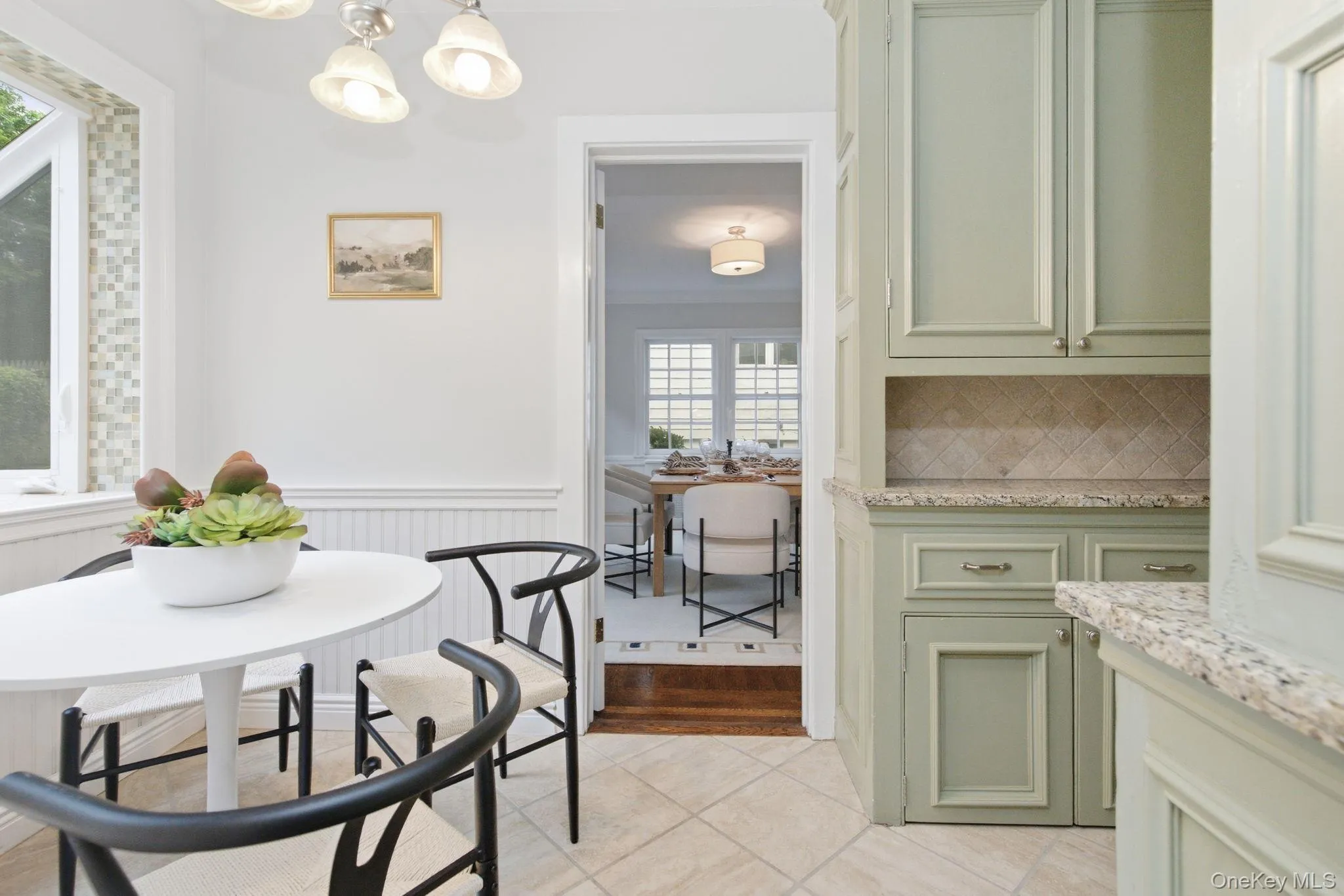 The butler's pantry adds serving space and storage beside the breakfast room. The butler's pantry adds serving space and storage beside the breakfast room.