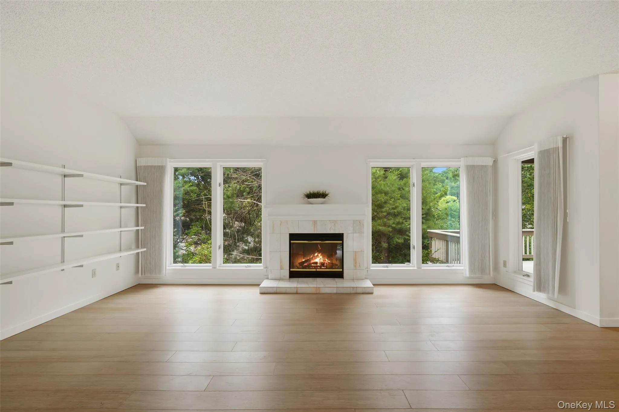 Formal living room with wood burning fireplace Formal living room with wood burning fireplace