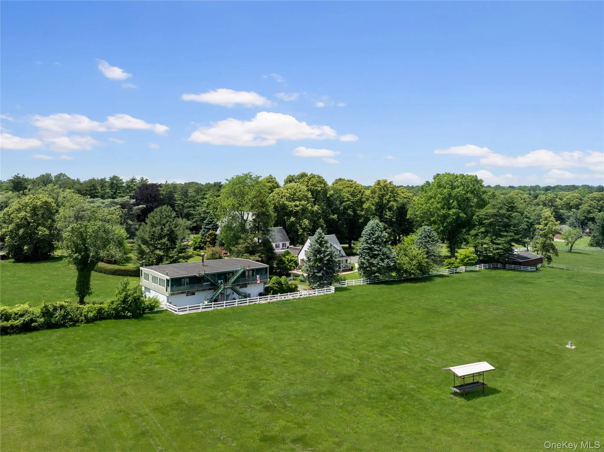 Side Aerial of the Property and Paddocks Side Aerial of the Property and Paddocks
