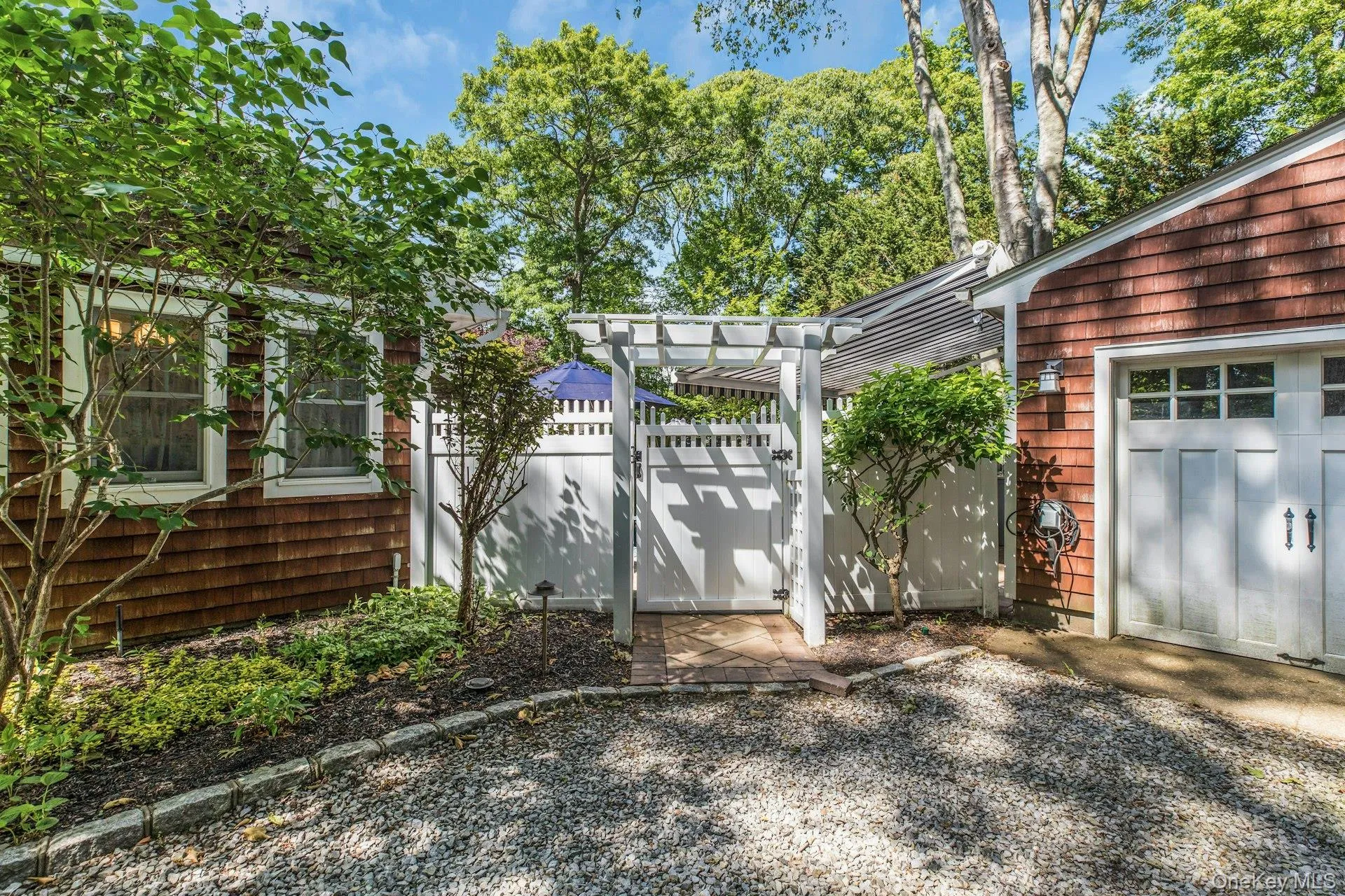 Expansive detached garage going out back to pool oasis. Expansive detached garage going out back to pool oasis.
