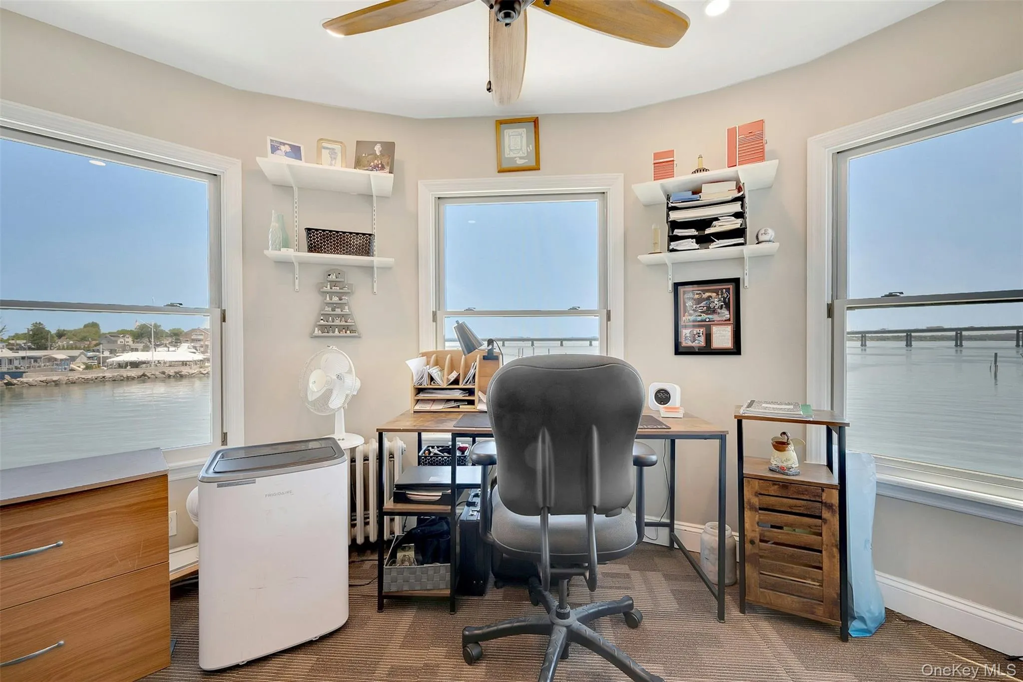 Office with hurricane windows with views of Long Island Sound Office with hurricane windows with views of Long Island Sound