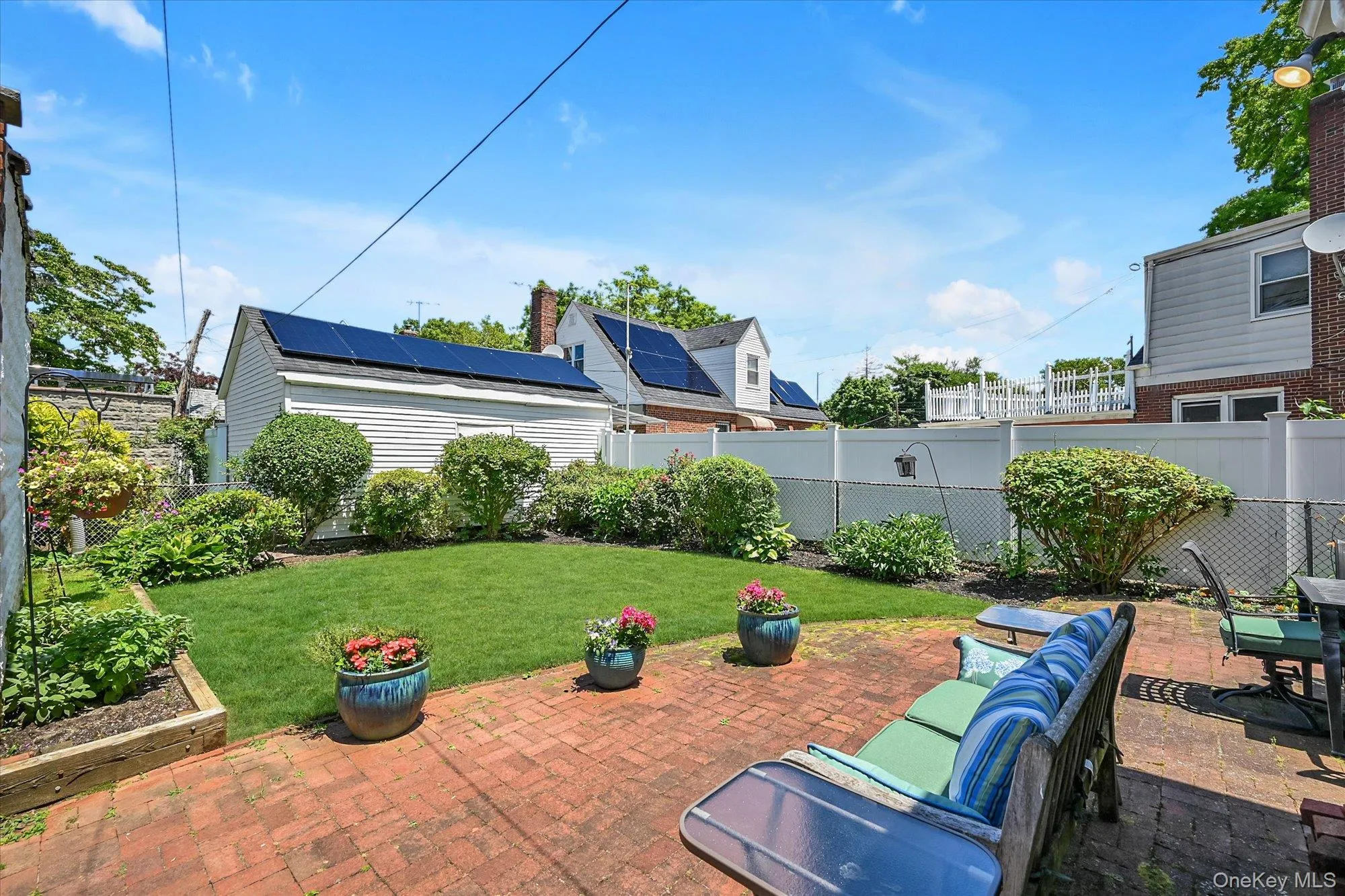 Backyard With Patio and Gardens. Backyard With Patio and Gardens.