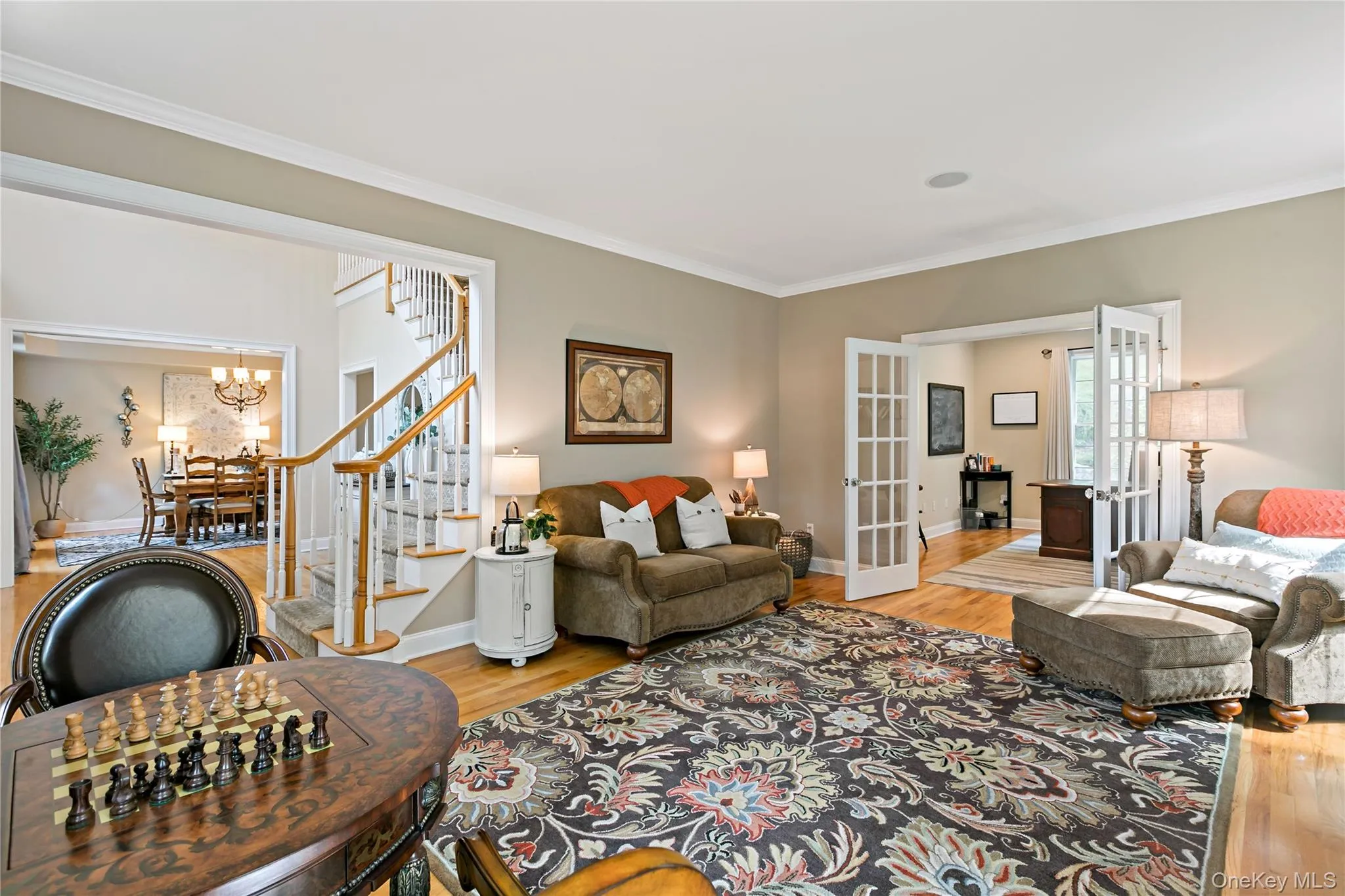 Formal living room showing open airy floorplan to entrance hall and beyond. Formal living room showing open airy floorplan to entrance hall and beyond.