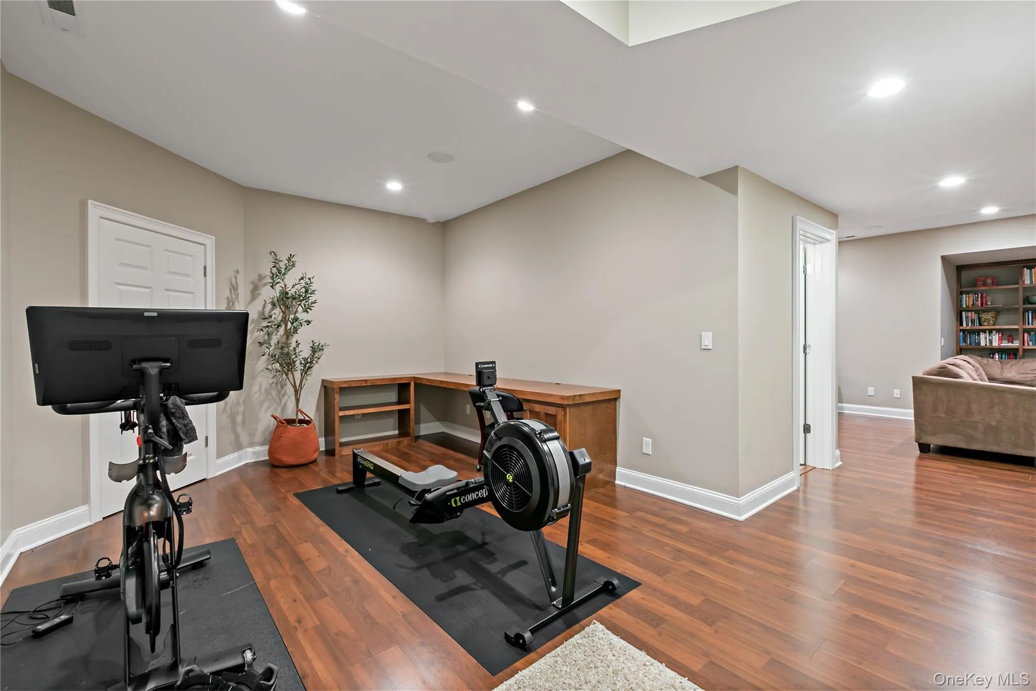 Lower level office being used for extra gym equipment. Lower level office being used for extra gym equipment.