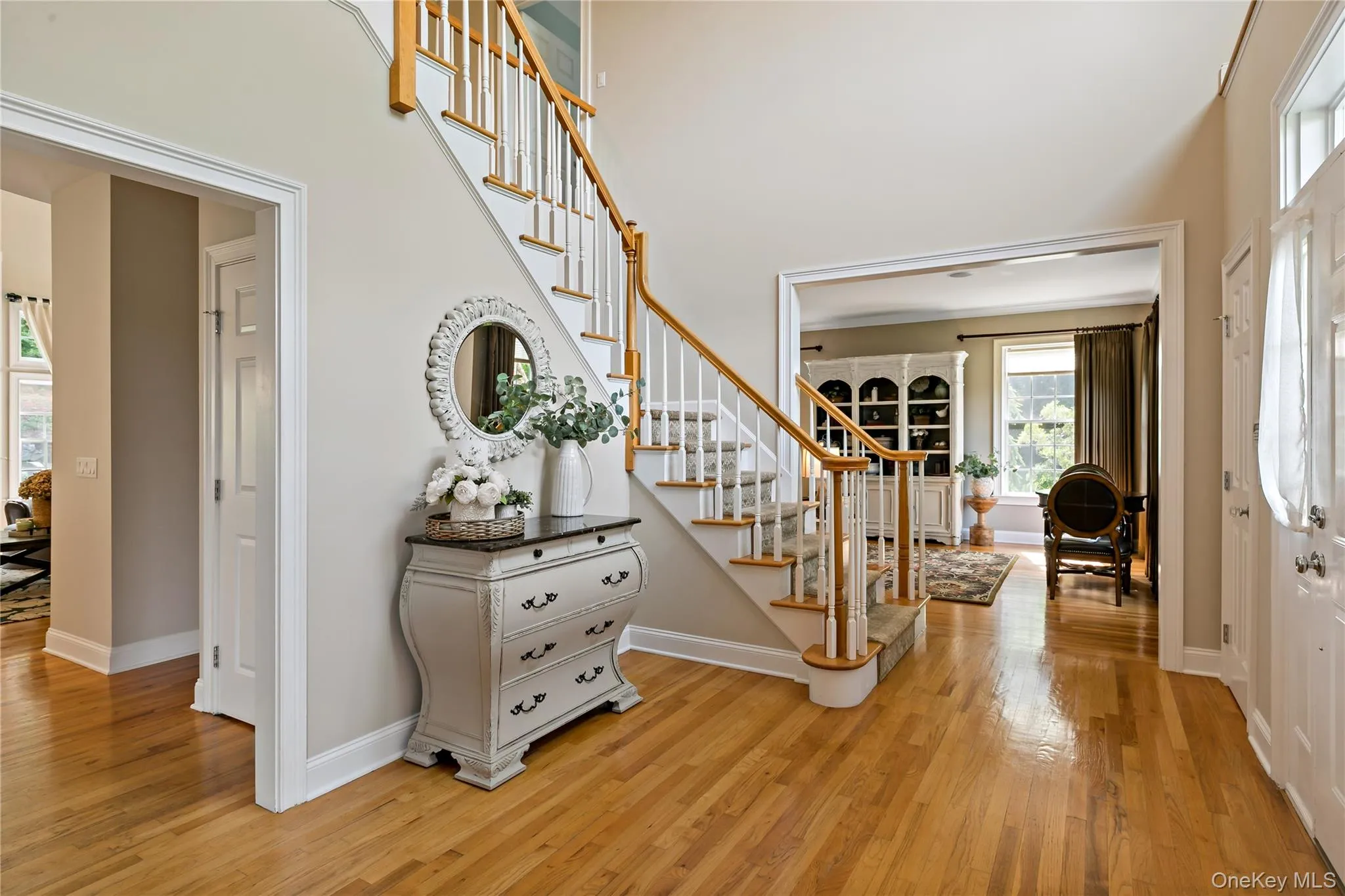 Dramatic two story entry with adjustable chandelier. Dramatic two story entry with adjustable chandelier.