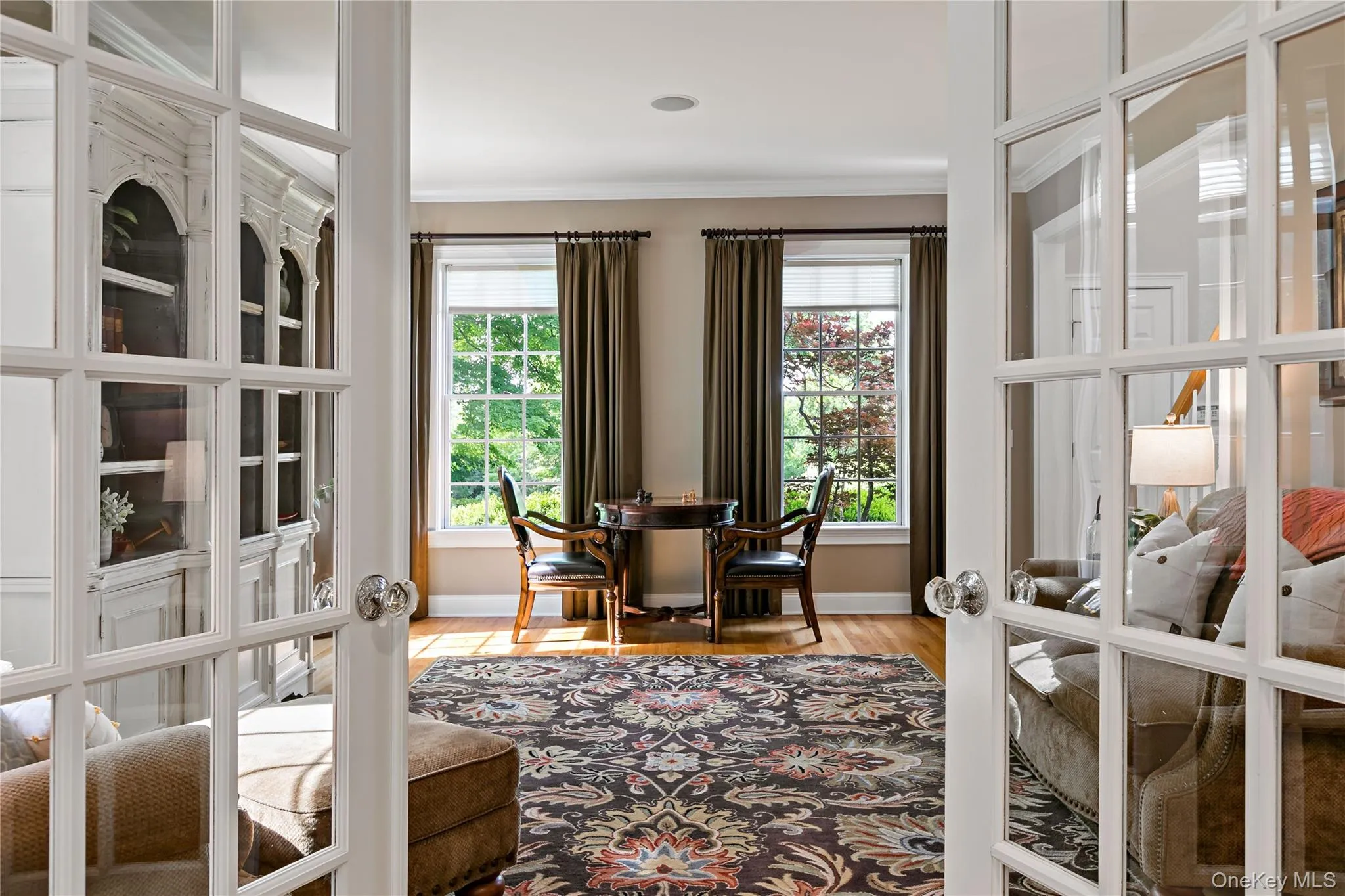 French doors between study and formal living room. Chess anyone? French doors between study and formal living room. Chess anyone?