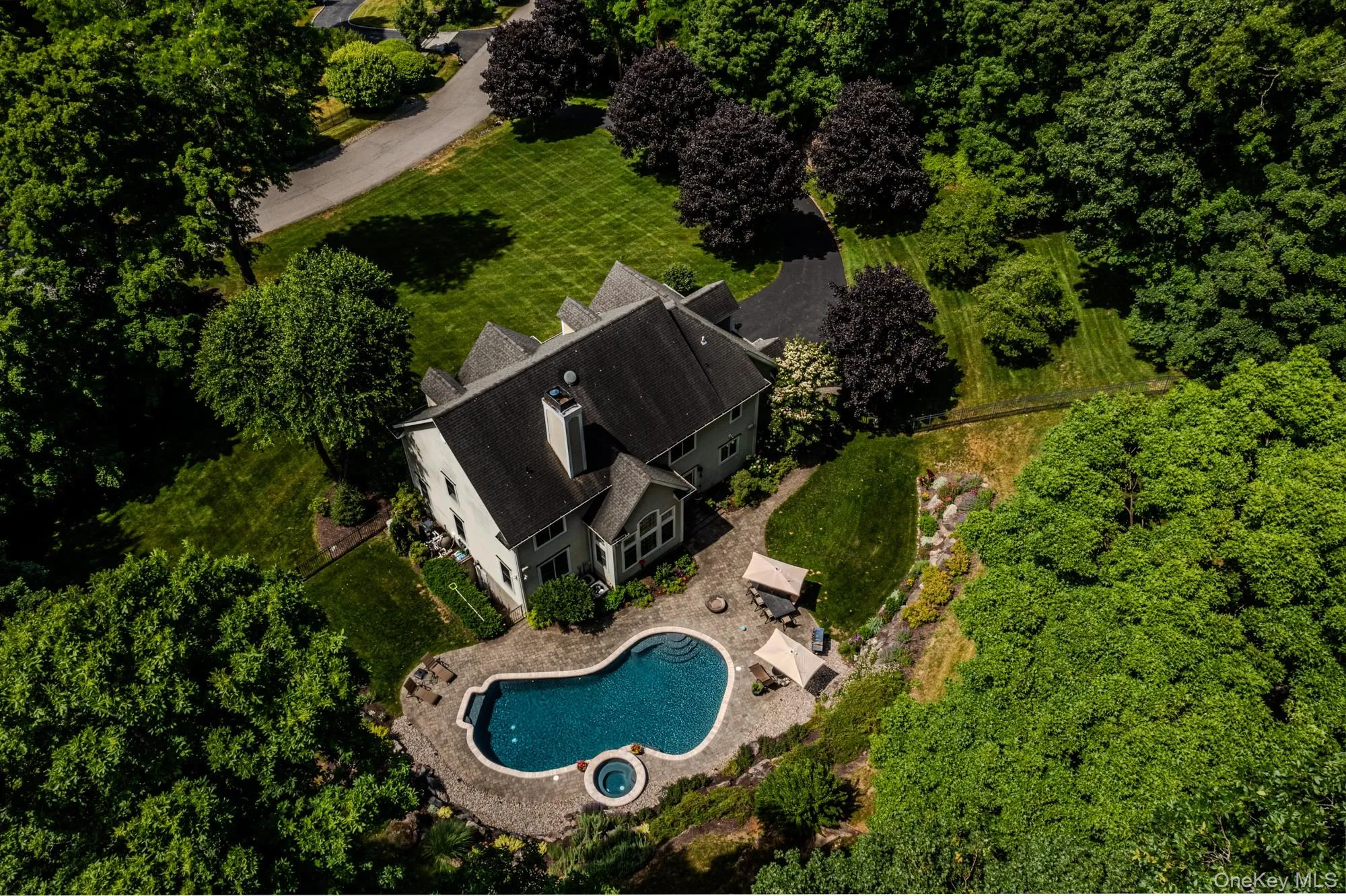 Aerial view showing accessibility of the pool to the home. Aerial view showing accessibility of the pool to the home.