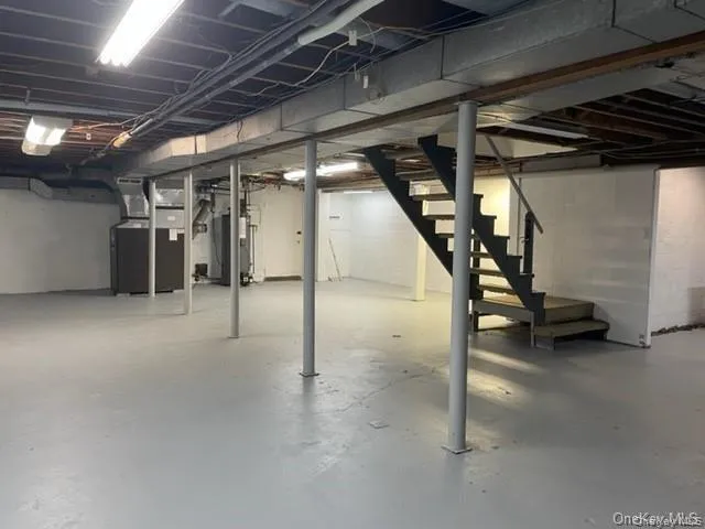Basement with water heater and heating utilities Basement with water heater and heating utilities