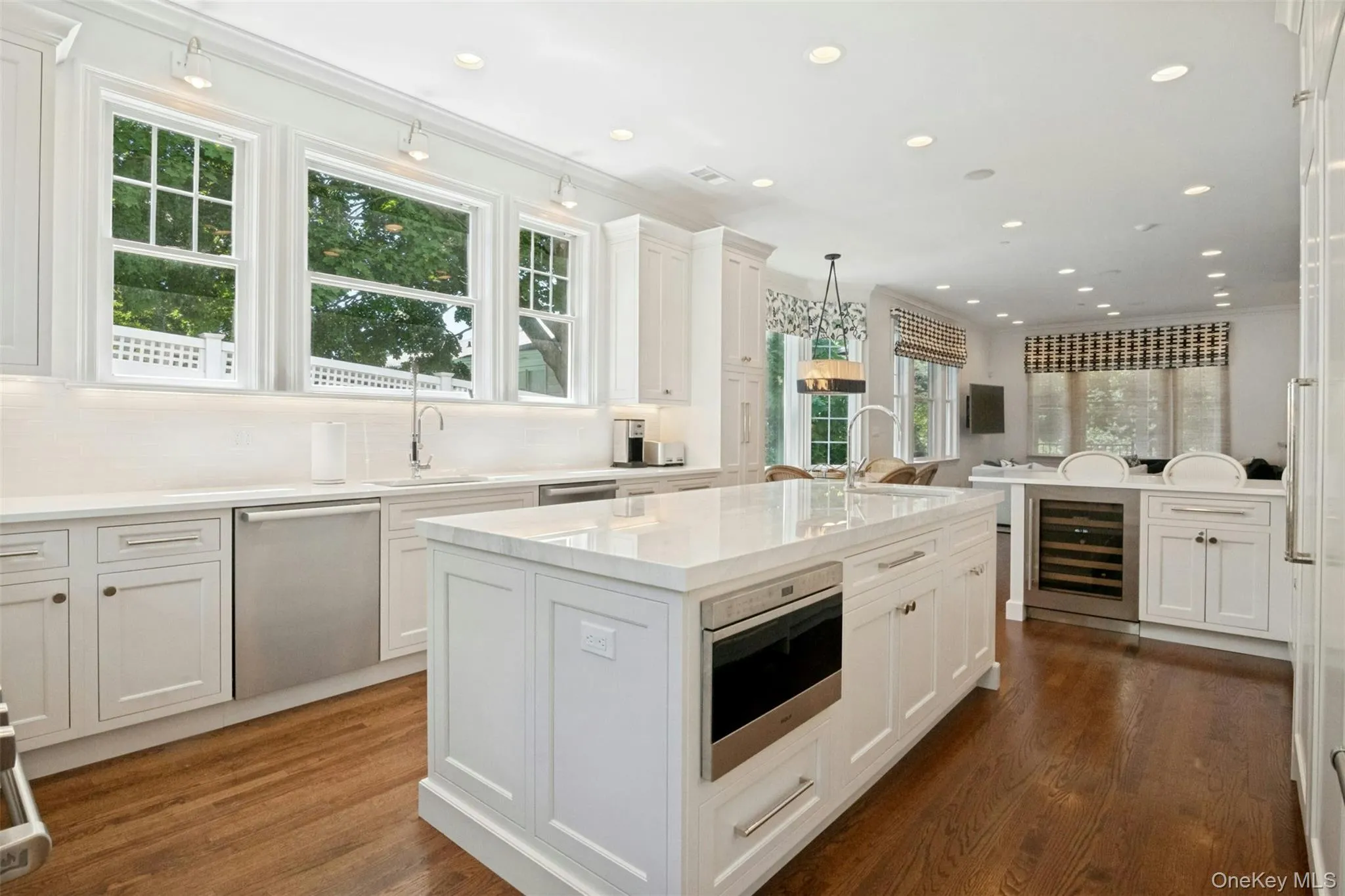 High end appliances and lots of storage cabinets High end appliances and lots of storage cabinets