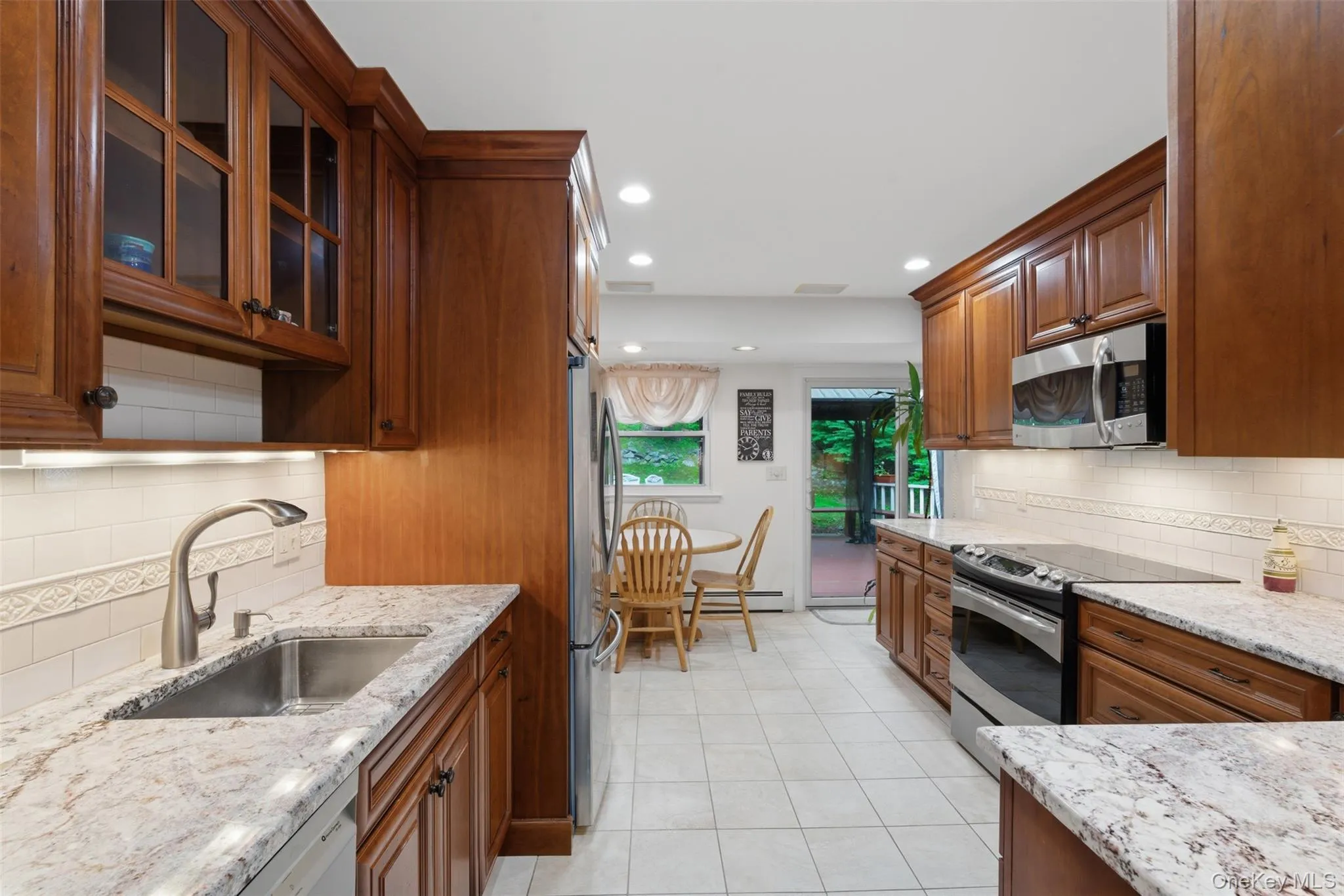 Updated kitchen, with beautiful cabinetry and granite countertops Updated kitchen, with beautiful cabinetry and granite countertops