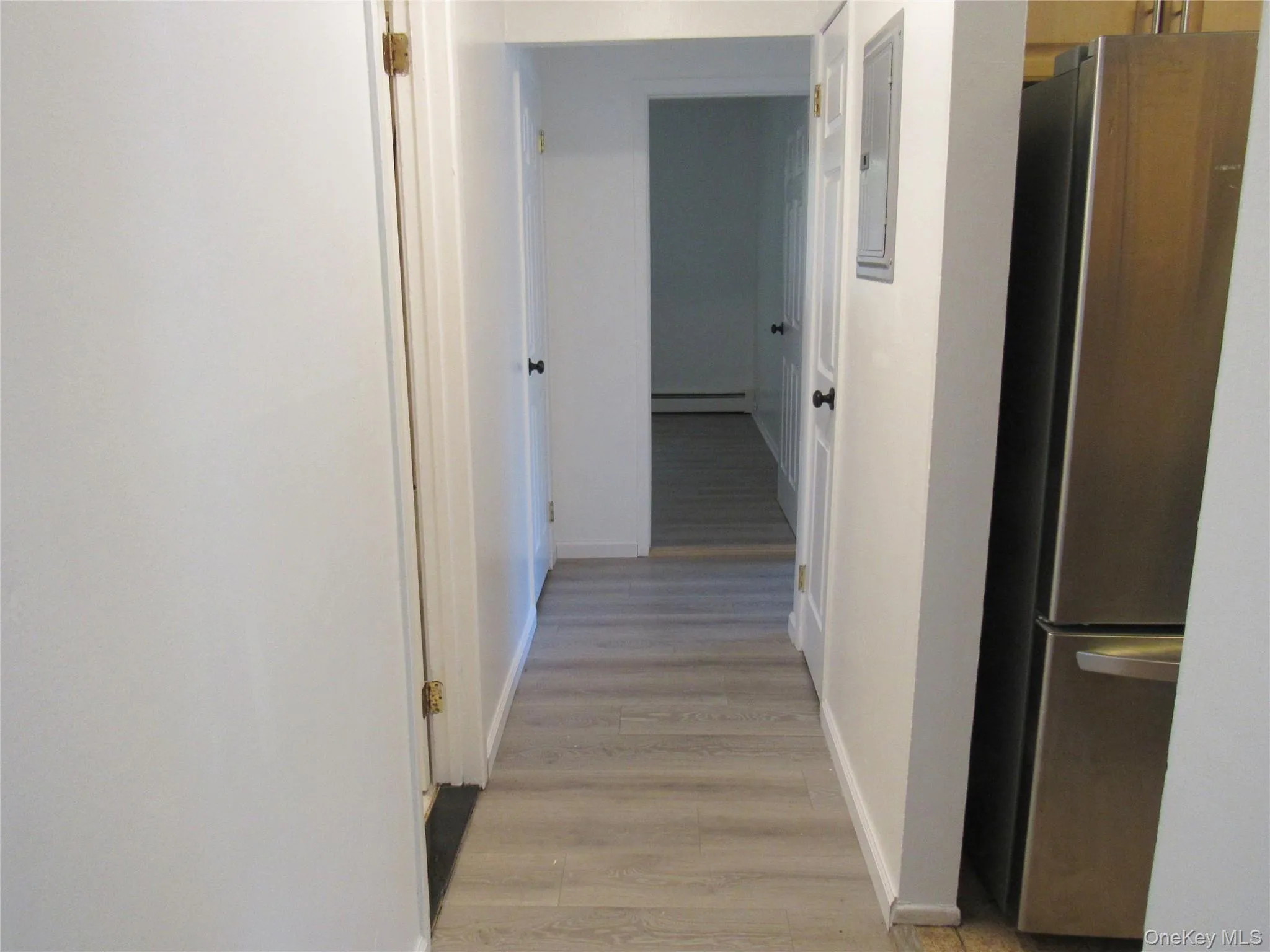Linen and coat closet found in hallway Linen and coat closet found in hallway